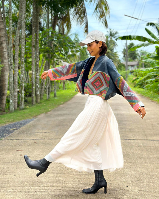 How to wear a pleated white maxi skirt combined with handwoven hemp jacket