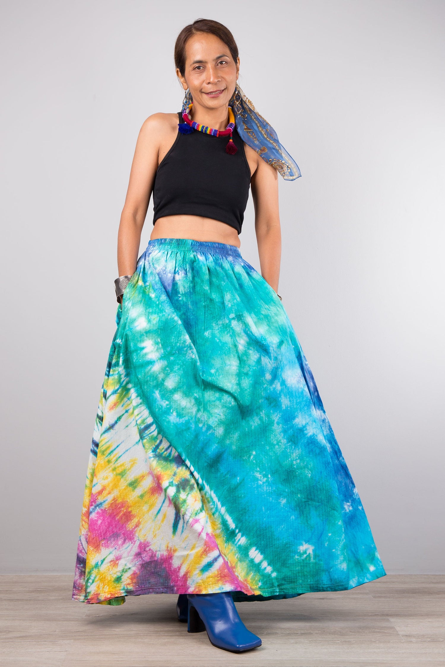 Tie dye skirt, mainly aqua colour, with pockets and elastic waist