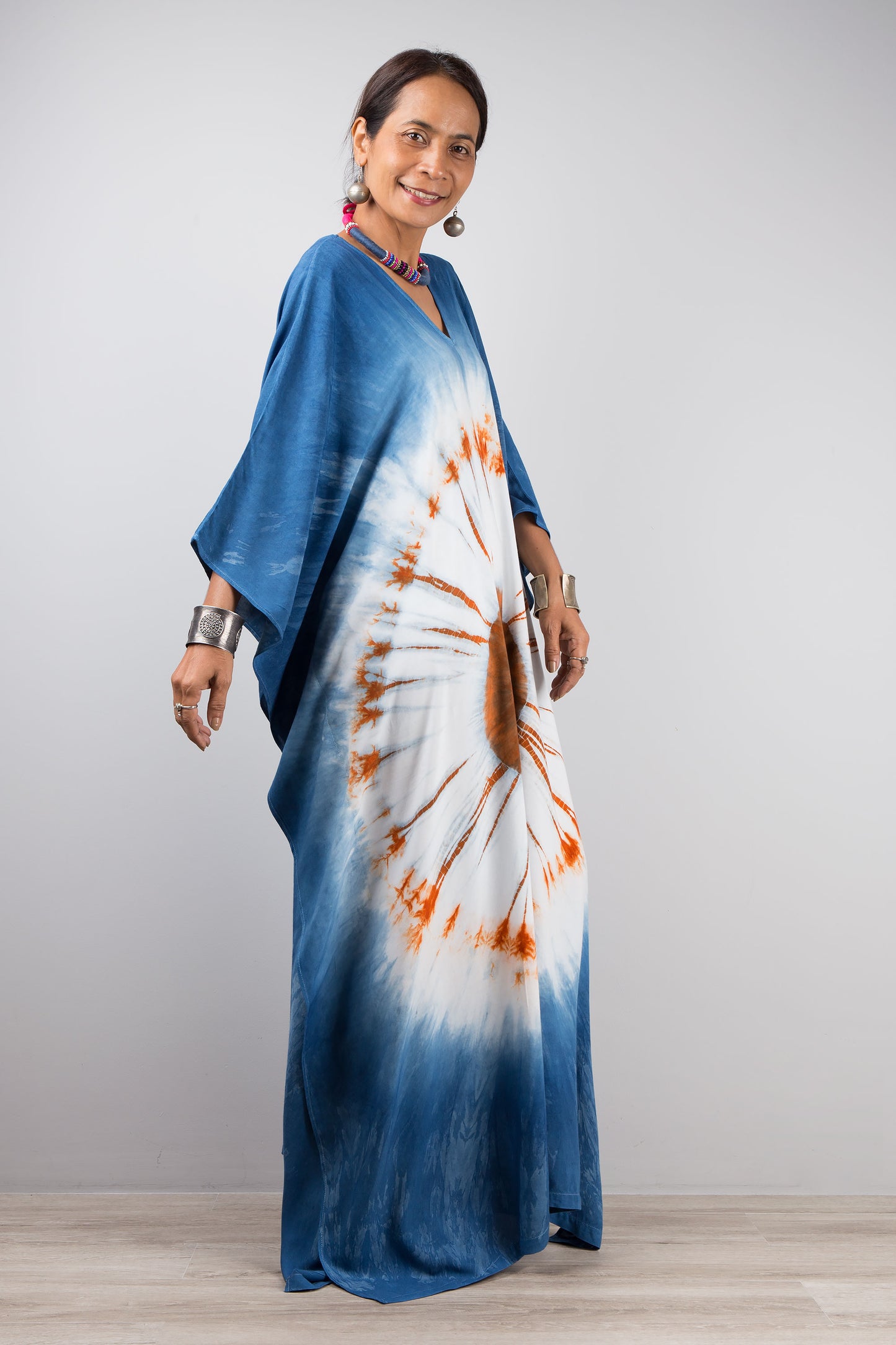 Indigo tie dye kaftan dress by Nuichan. Modern shibori dresses at affordable prices