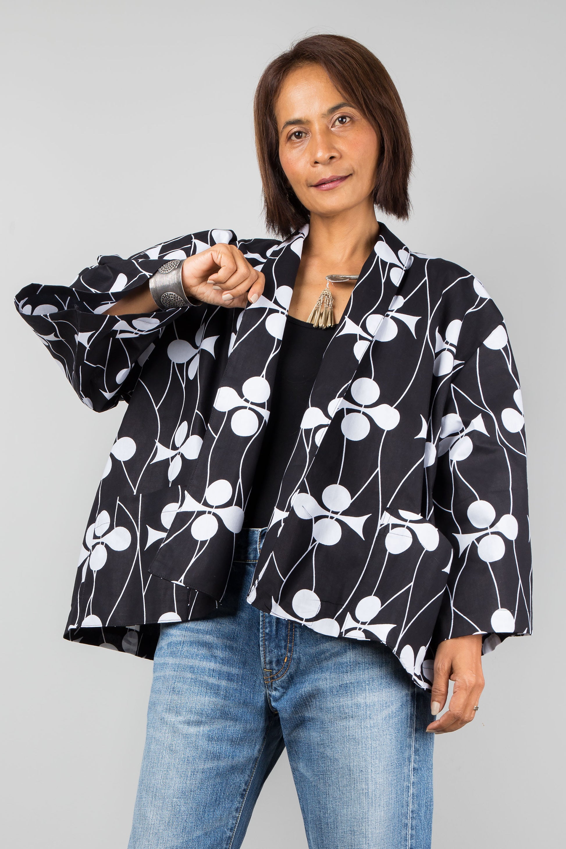 Black and White Ankara jacket top by Nuichan. Short kimono jacket with pockets