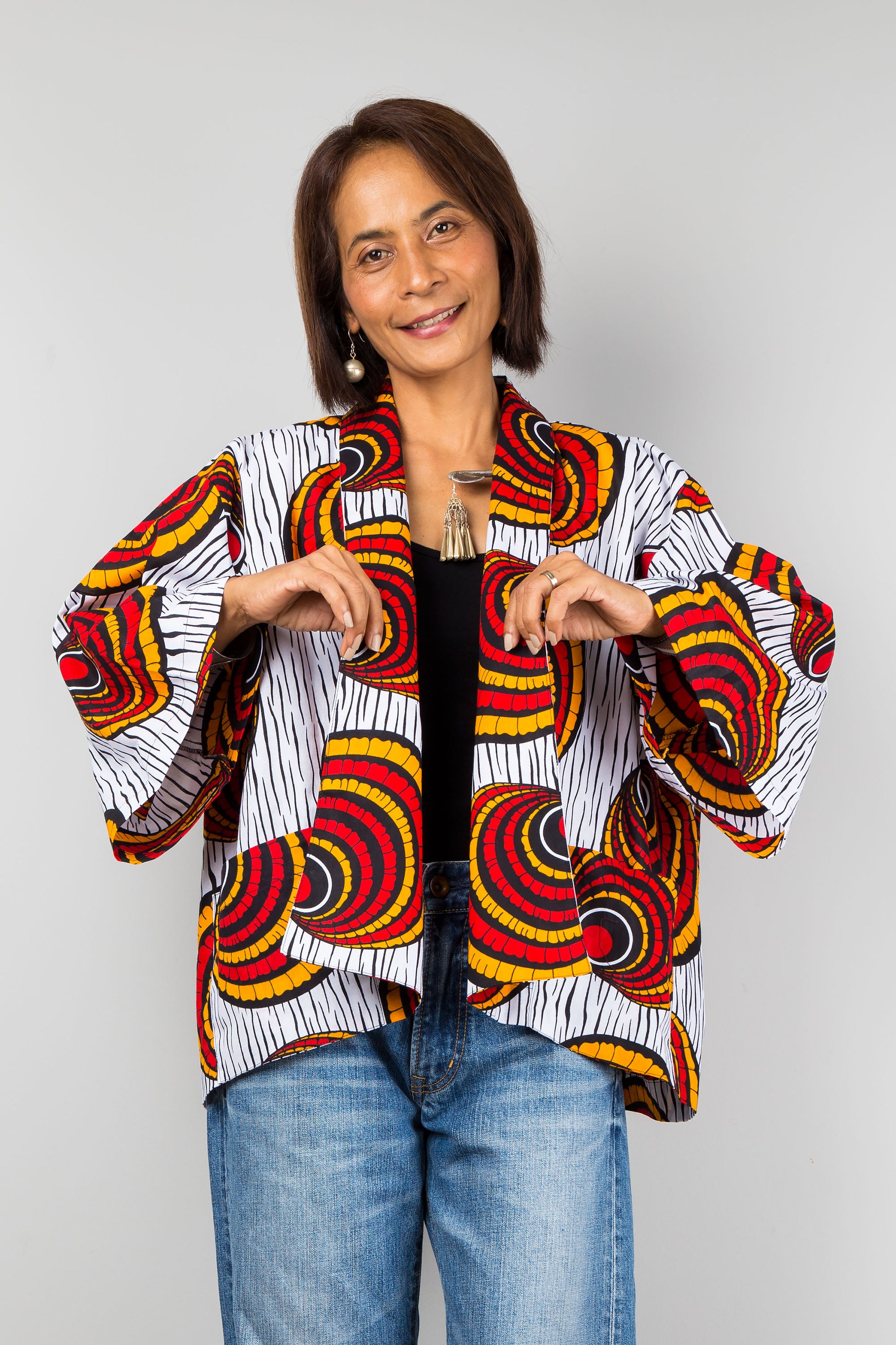 African kimono jacket top.  Short cardigan top in ankara fabric. Front view