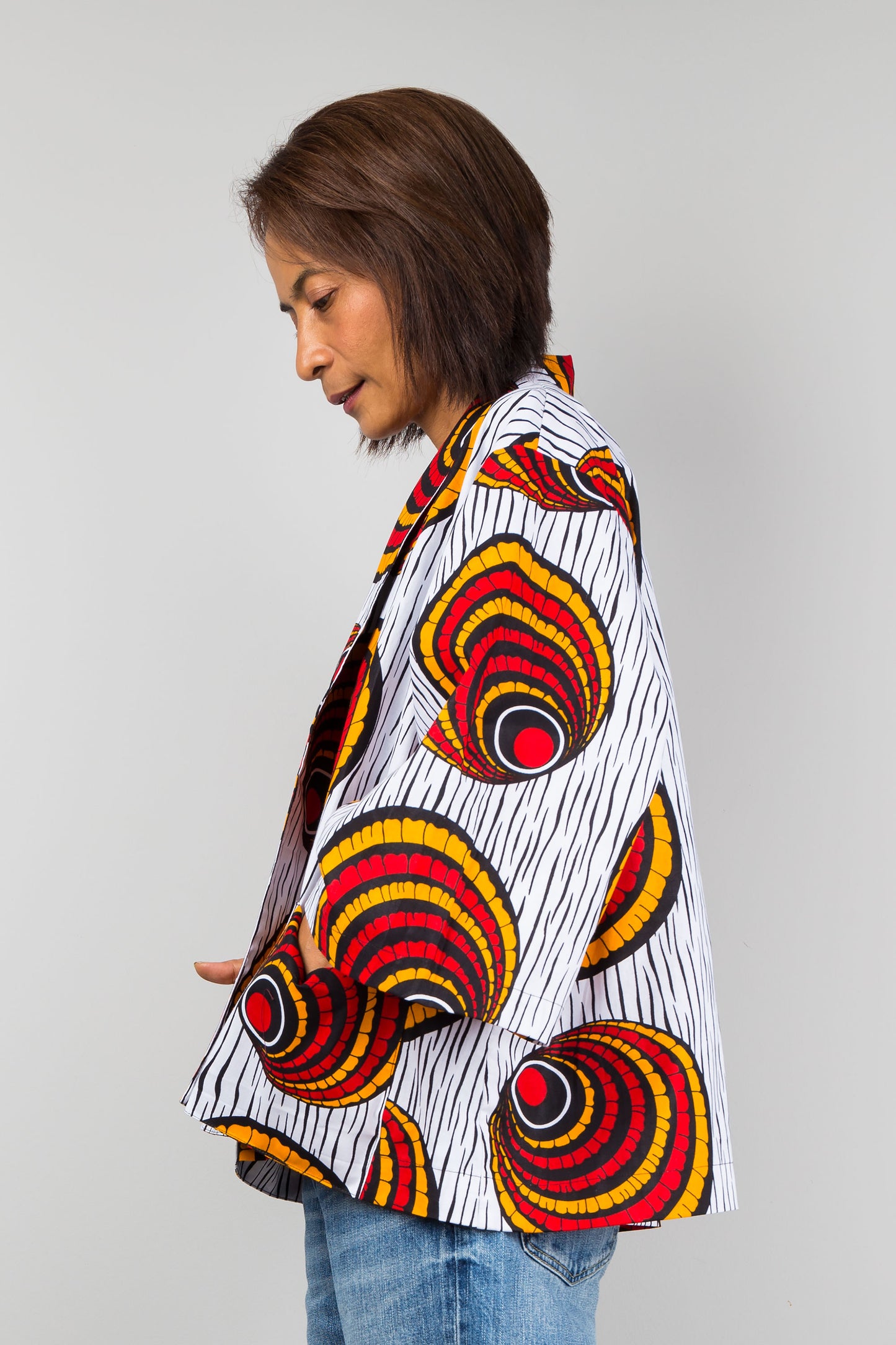 African kimono jacket top.  Short jacket top in ankara fabric. Side view