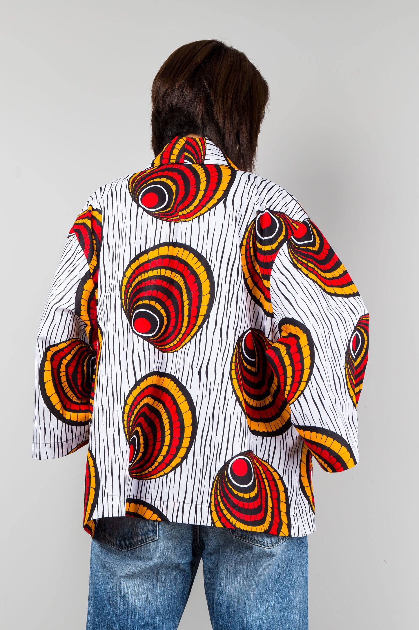 African kimono jacket top.  Short jacket top in ankara fabric. Back view