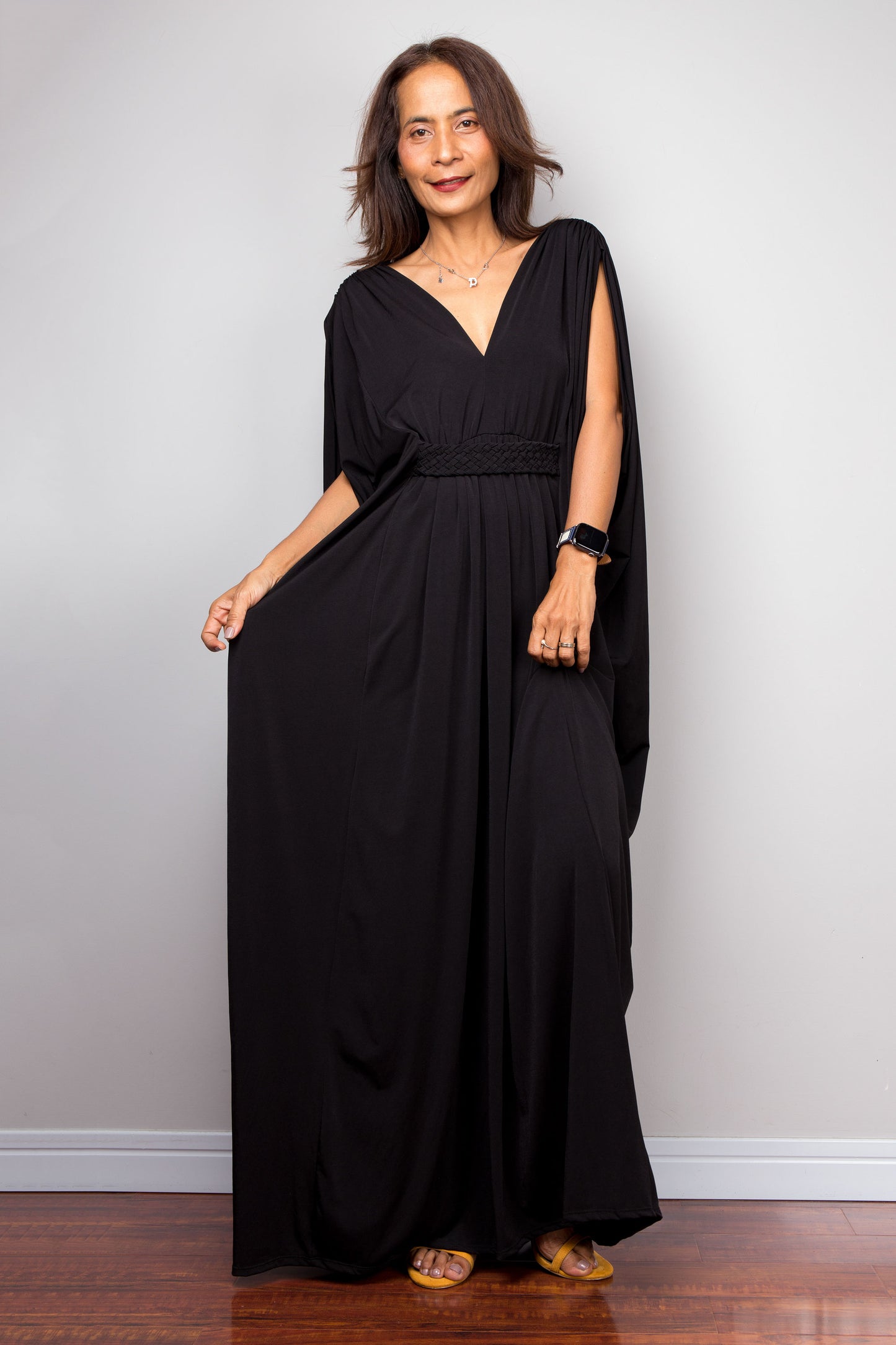 Long black kaftan dress with v neck and braided detail on the waist. Free size black caftan by Nuichan