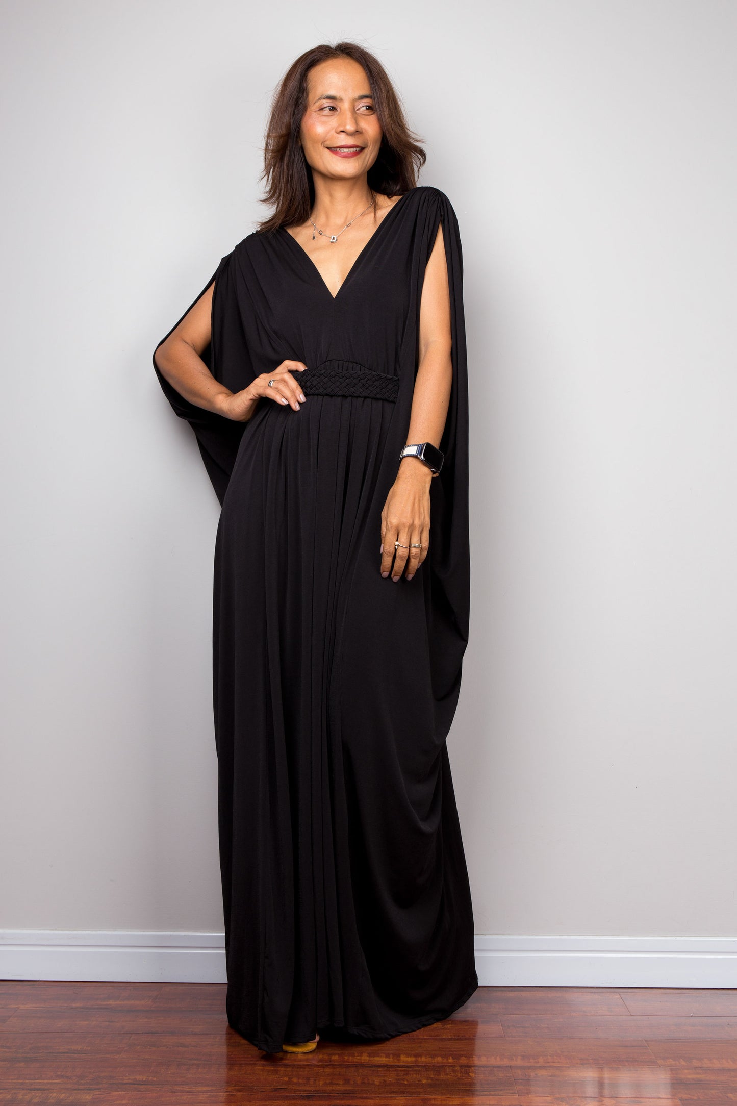 Long black kaftan dress with v neck and braided detail on the waist