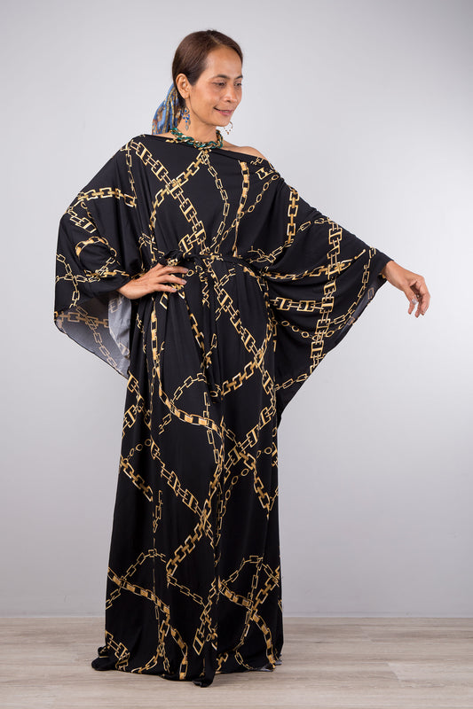 Black boho kaftan dress by Nuichan.  Large, loose fitting caftan with boho print