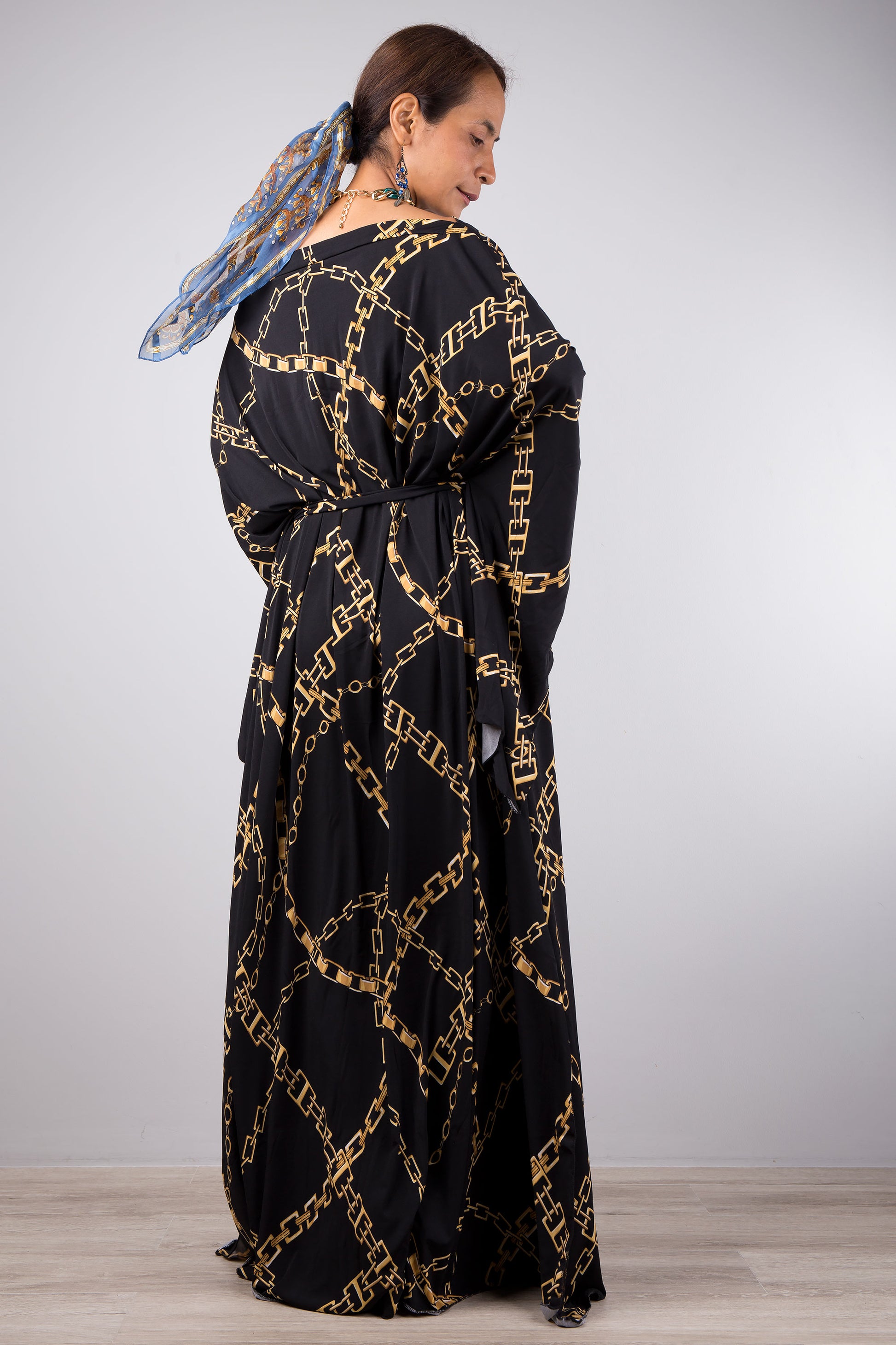 Black caftan dress by Nuichan