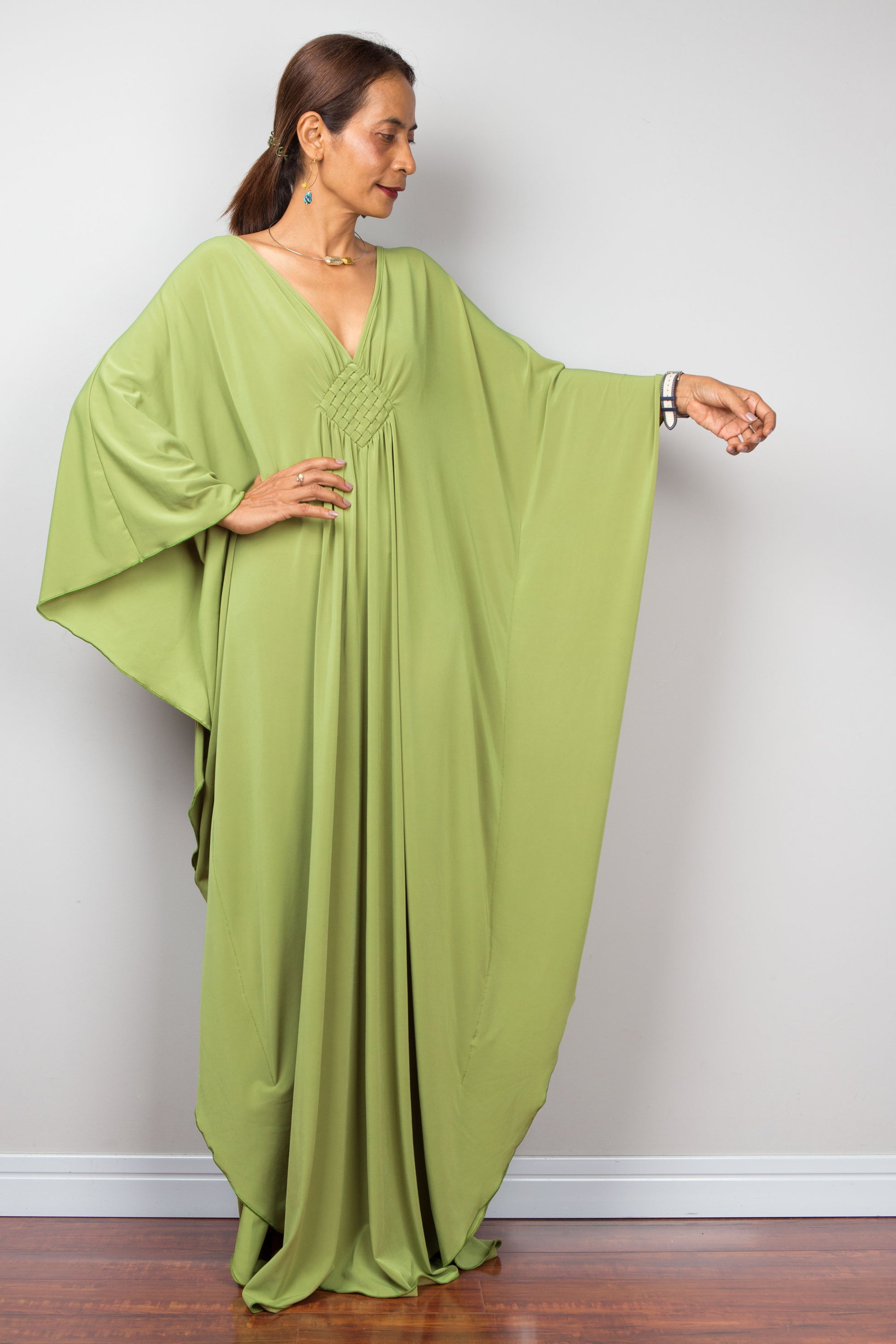 Fern green kaftan dress with plunging neckline - showing batwing sleeves - front view