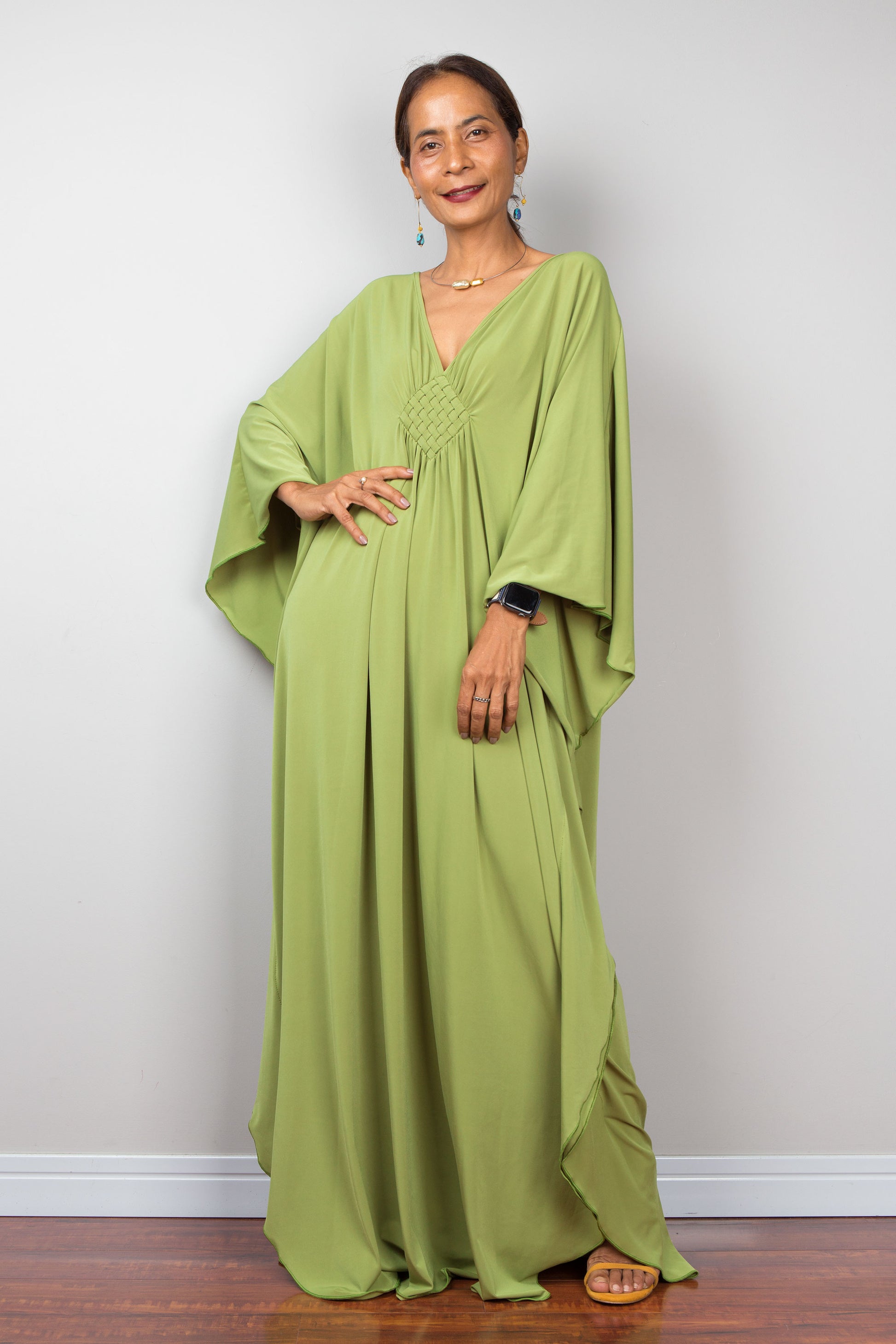 Fern green kaftan maxi dress with plunging neckline and batwing sleeves - front view