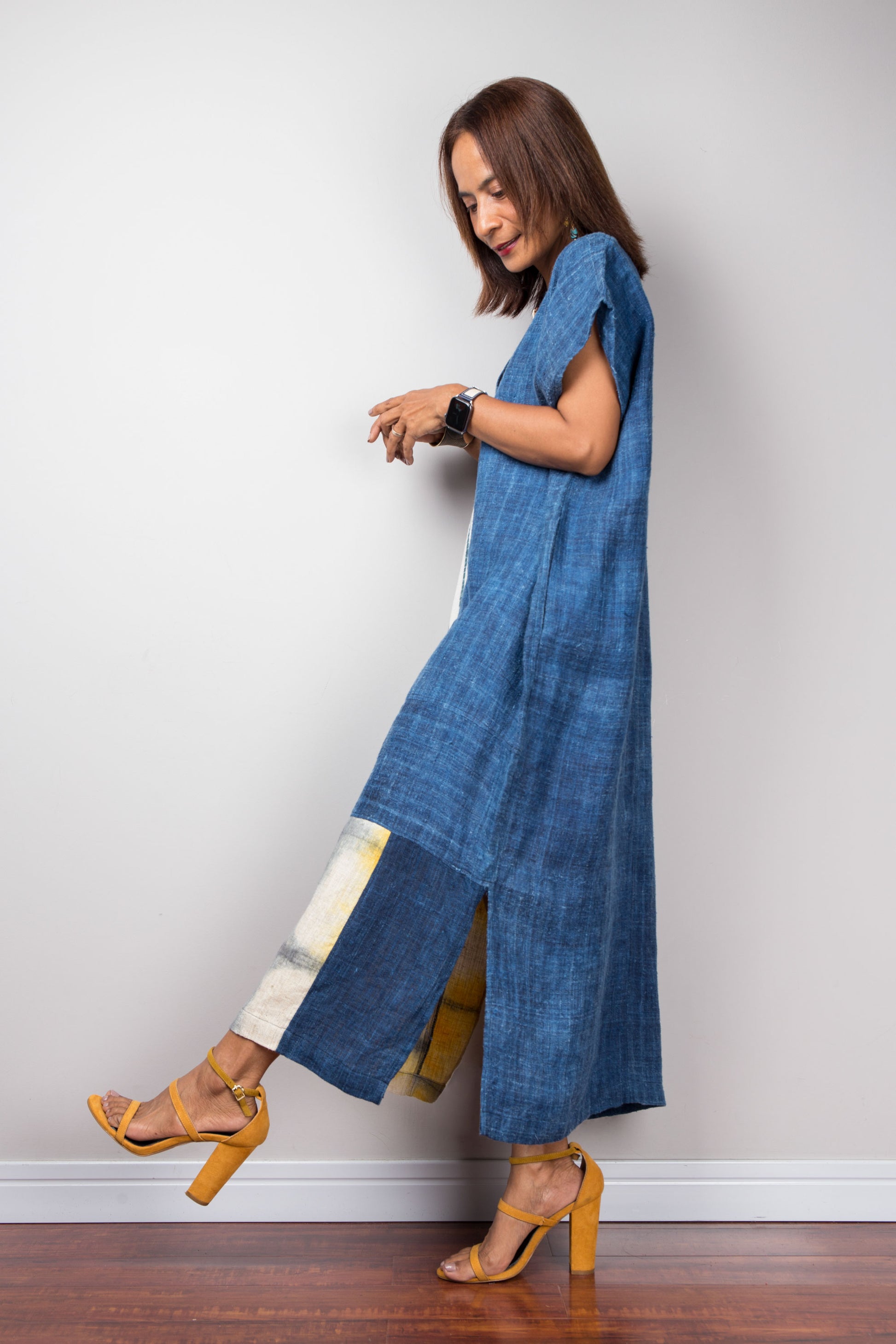 Hemp kaftan dress in indigo blue. side view