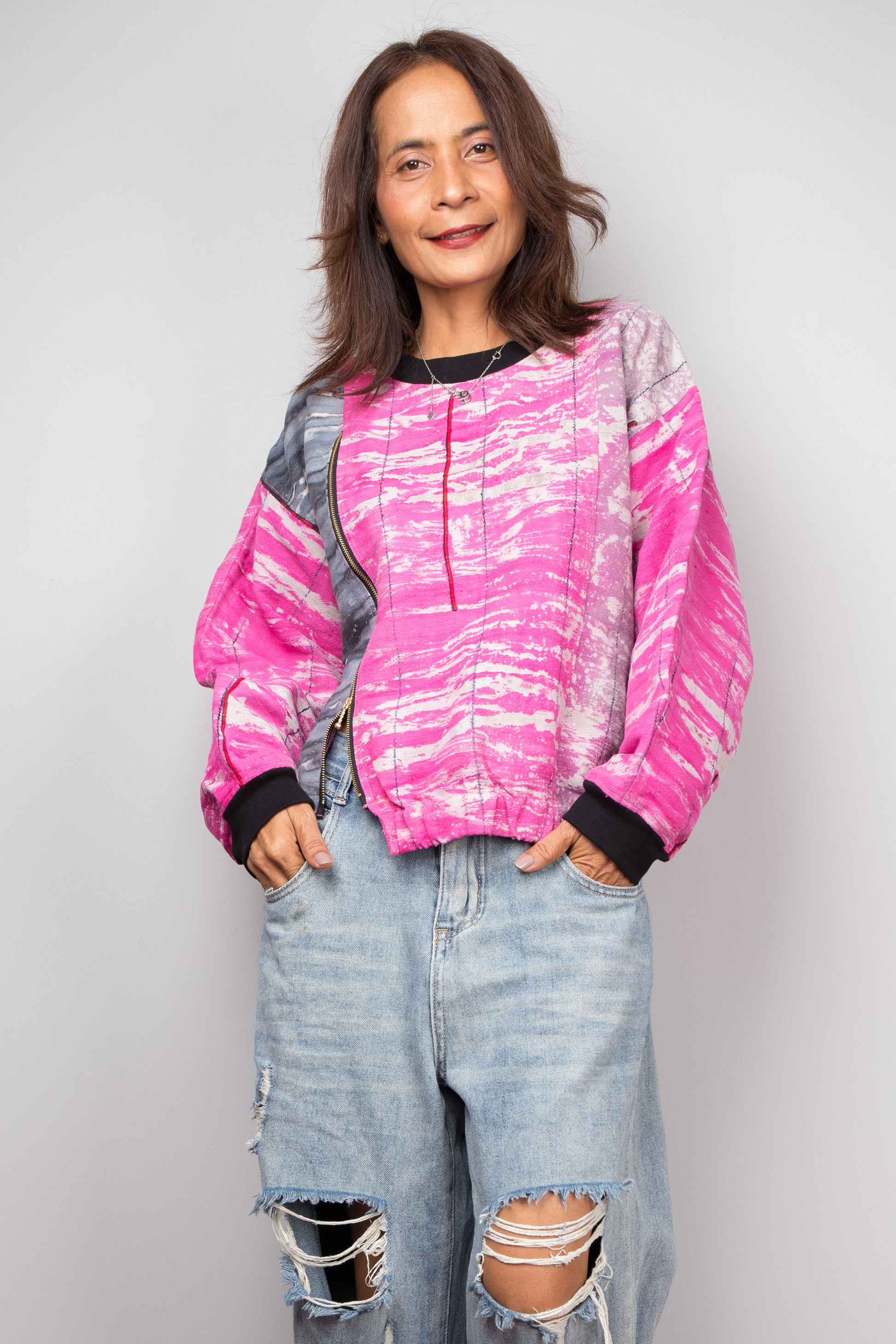 Pink pullover sweater with crew neck and big front zipper