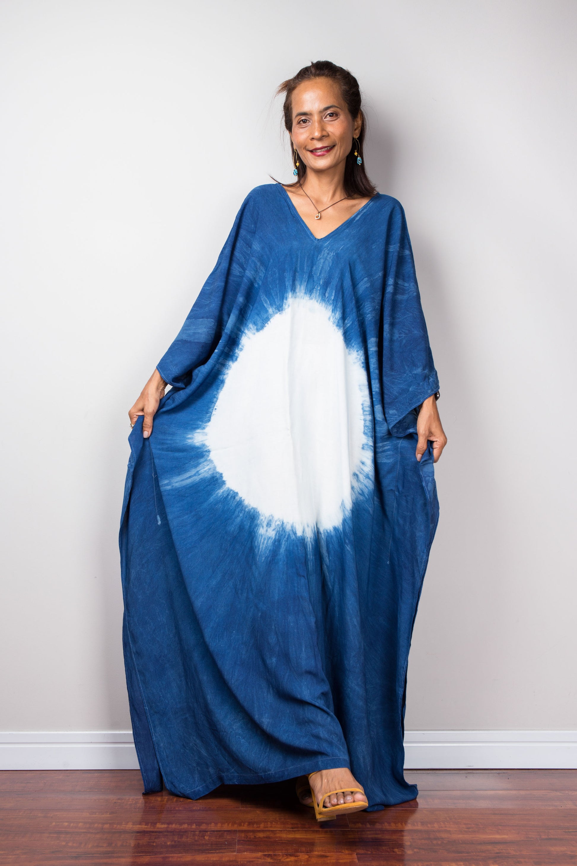 Indigo caftan by Nuichan.  Blue tie dye kaftan dress with v neck