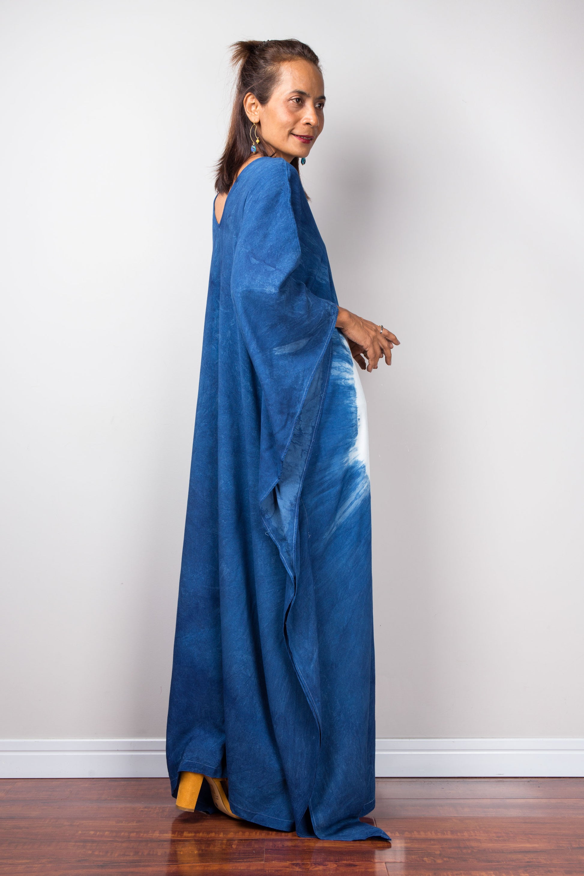 Indigo kaftan dress.  Large blue dress with big white circle at the front