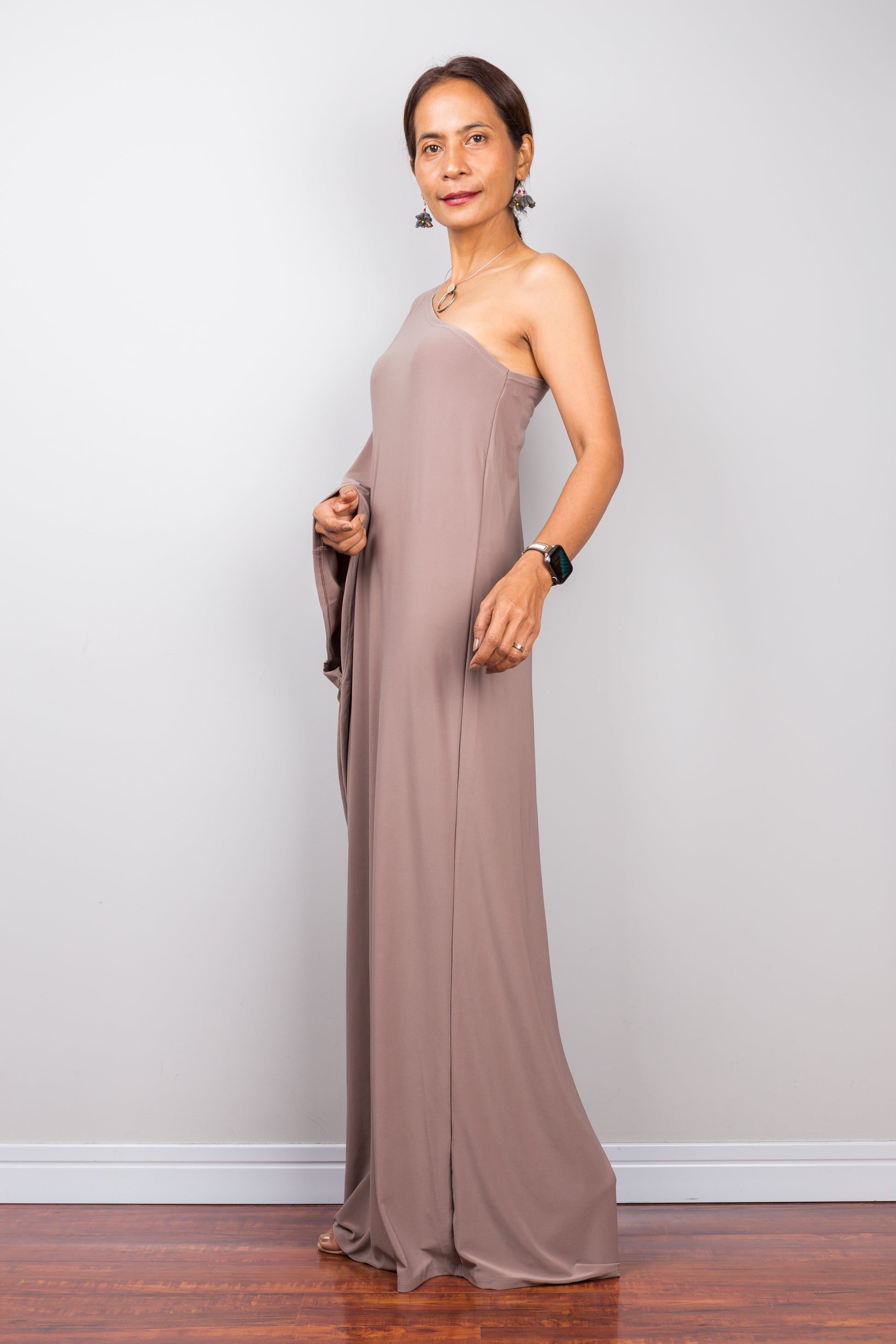 Off shoulder kaftan dress in taupe.  Asymmetrical evening dress by Nuichan