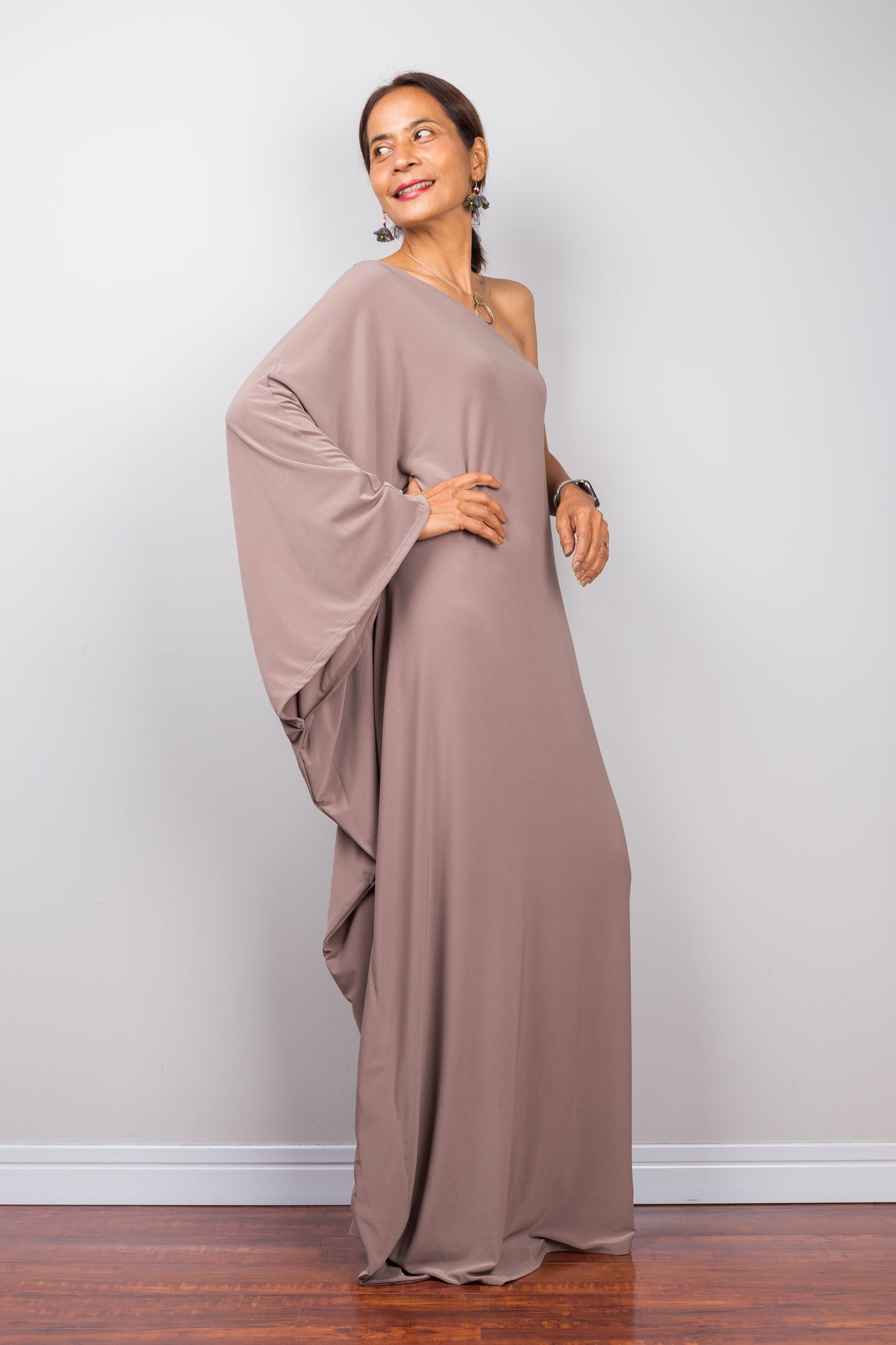 Taupe caftan dress by Nuichan.  Off shoulder evening dress