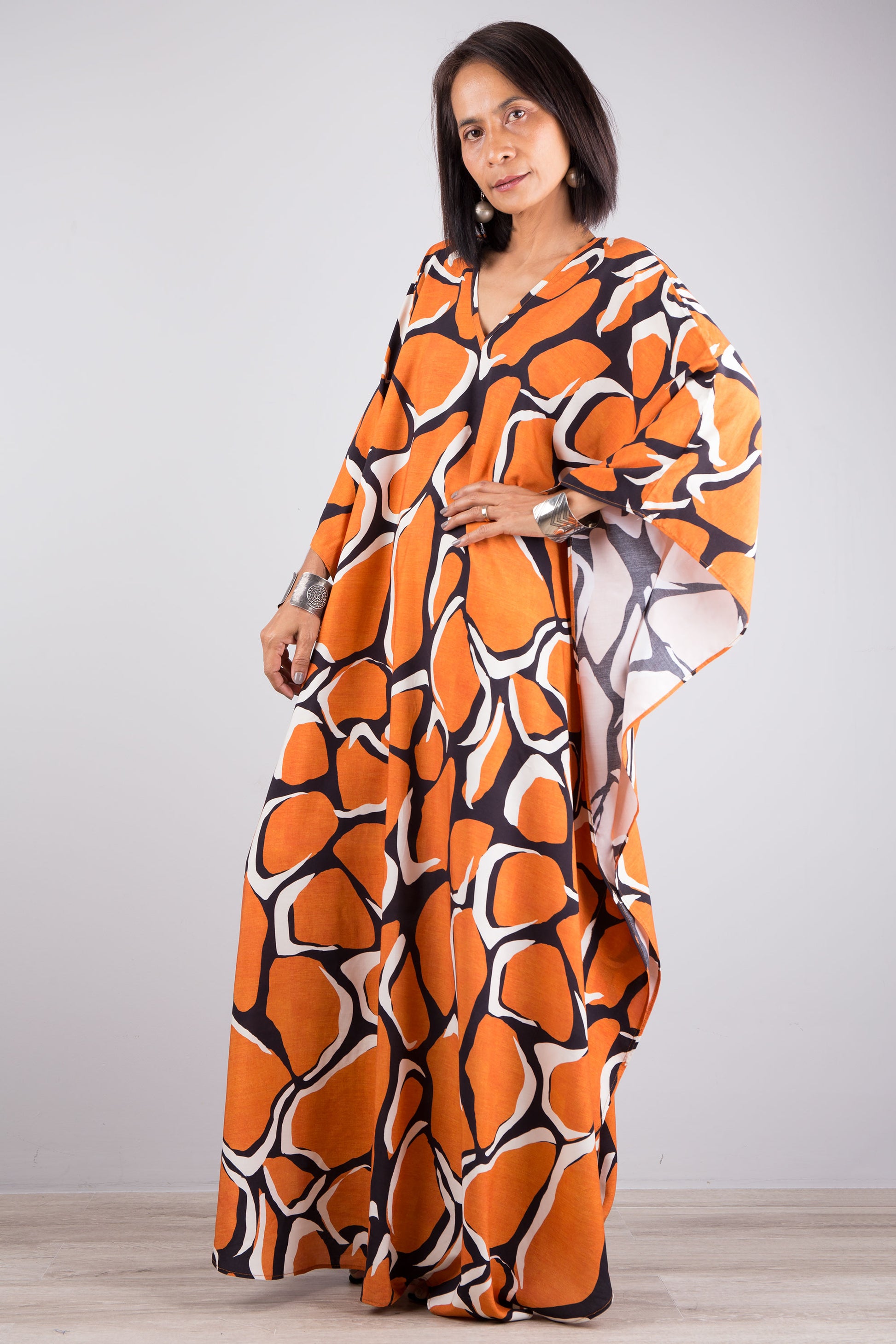 Orange maxi kaftan dress by Nuichan