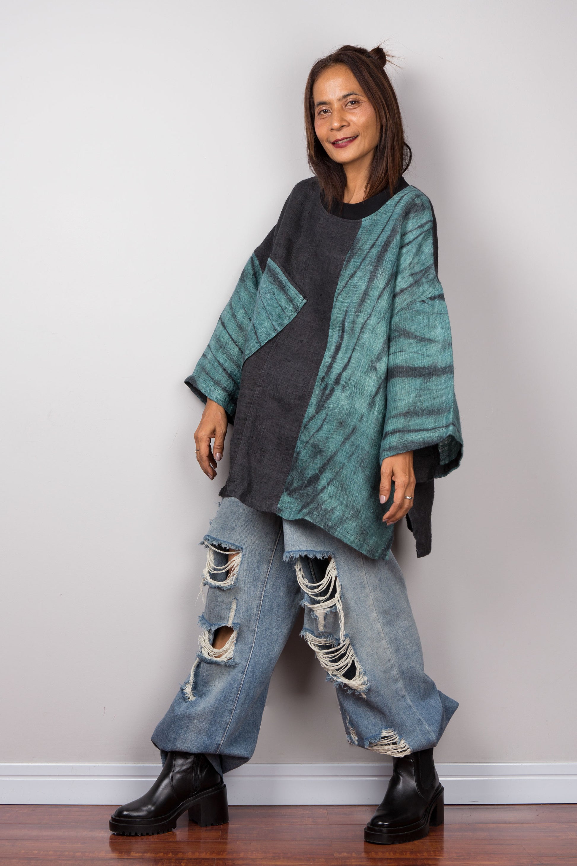 Two tone oversized shirt with big front pocket. Black and green tones with shibori tie dye detail. Streetwear style.