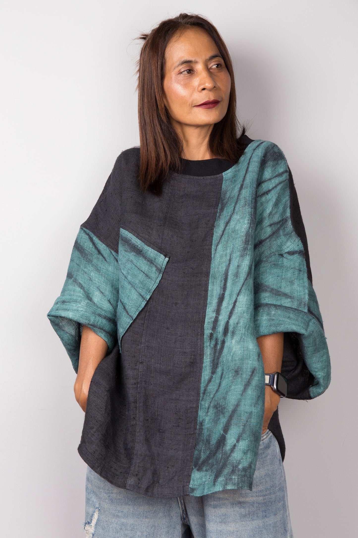 Two tone oversized shirt with big front pocket. Black and green tones with shibori tie dye detail.