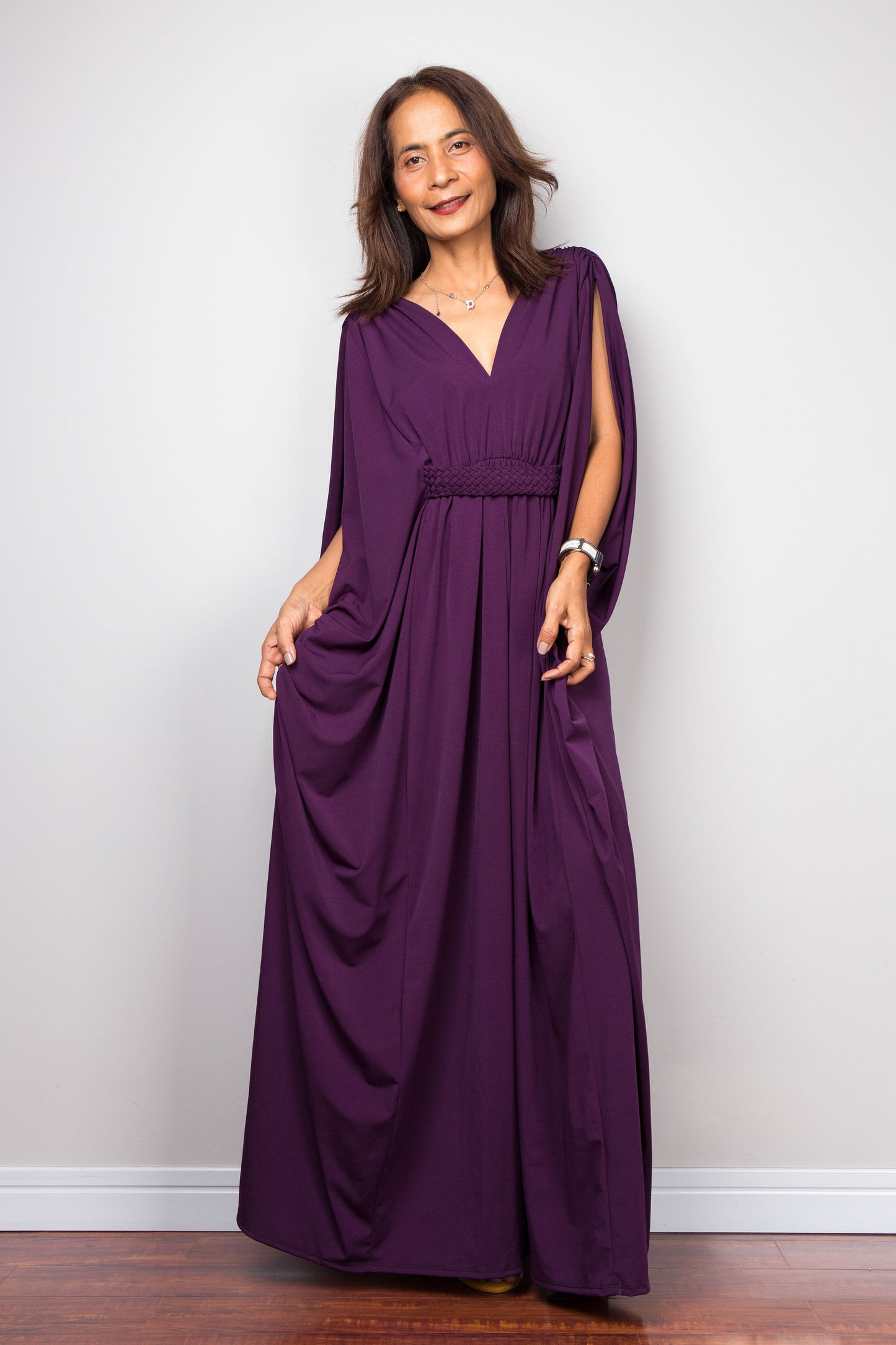 Purple maxi kaftan dress with v neck and braided waist band detail. Batwing sleeve design