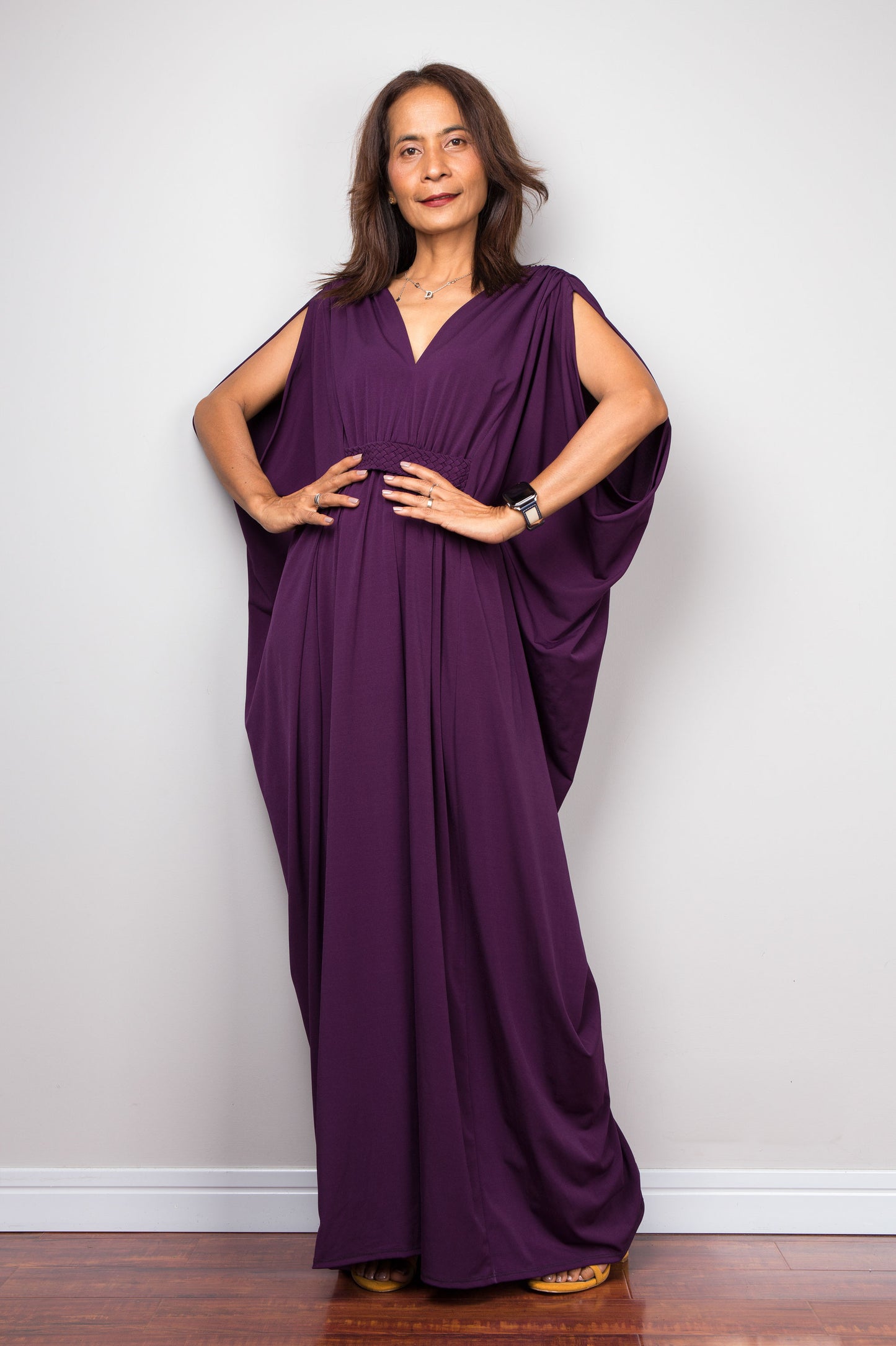 Purple maxi kaftan dress with v neck and braided waist band detail. Front view - batwing sleeve design