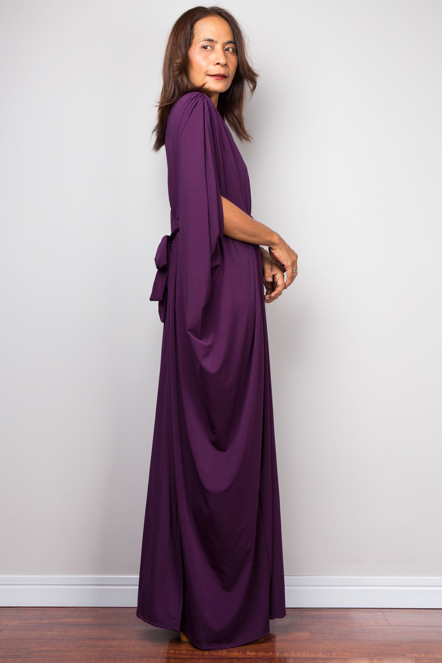 Purple maxi kaftan dress with v neck and braided waist band detail. Side view - sleeve design