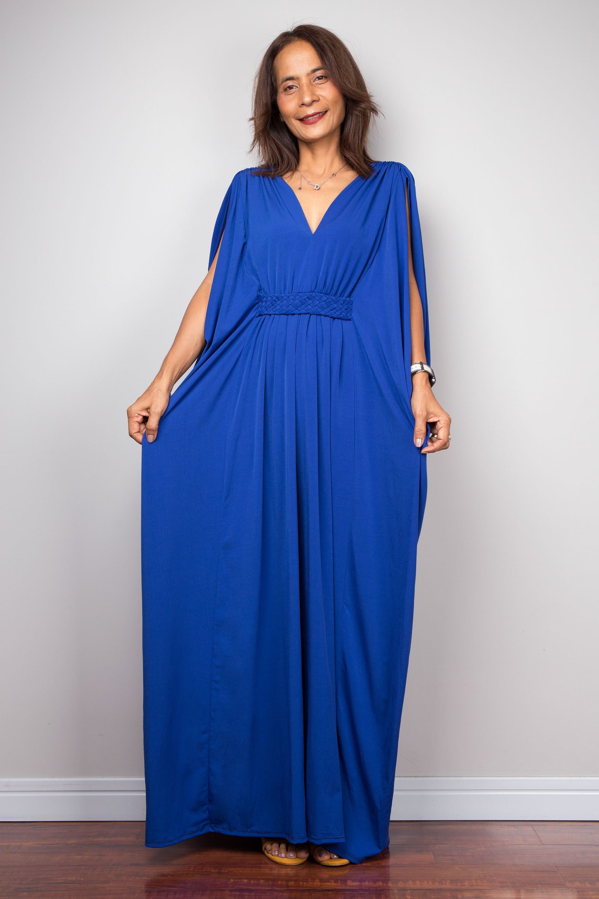 Royal blue caftan dress with braided waist detail. V neck and batwing sleeve design. High waist dress by Nuichan