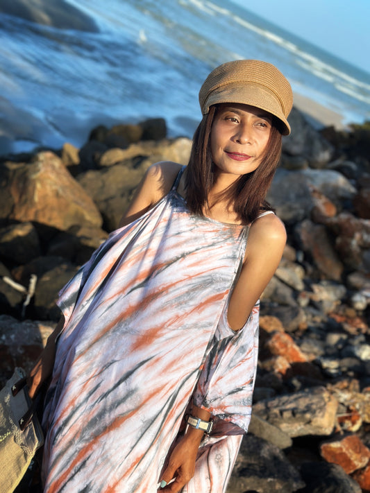 Shibori tie dye kaftan by Nuichan.  Cold shoulder dress in earth tones