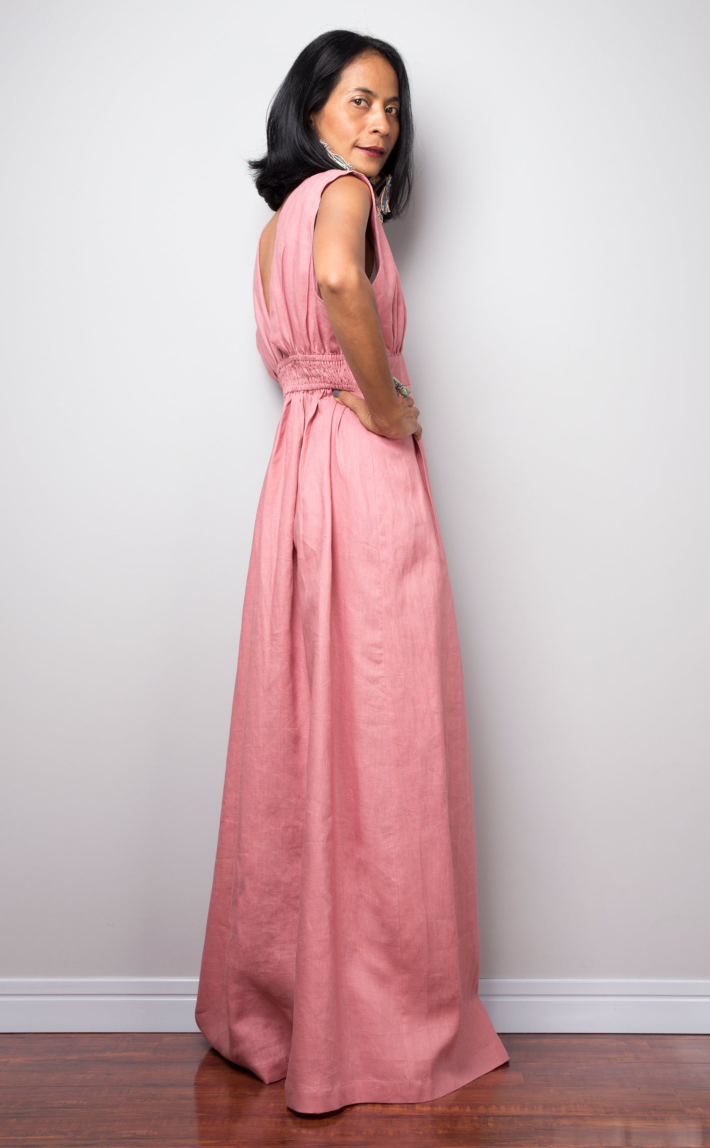 Pink Sleeveless Linen dress. Side view from the back