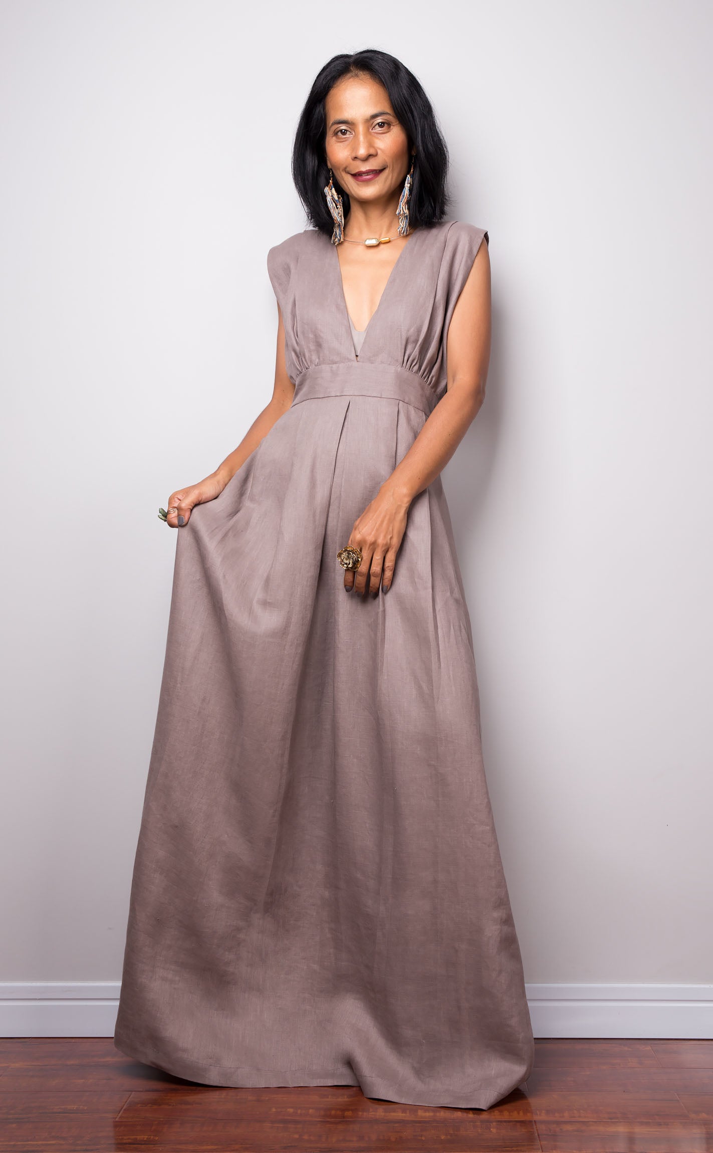 Taupe sleeveless linen dress with plunging neckline.  High waist design by Nuichan