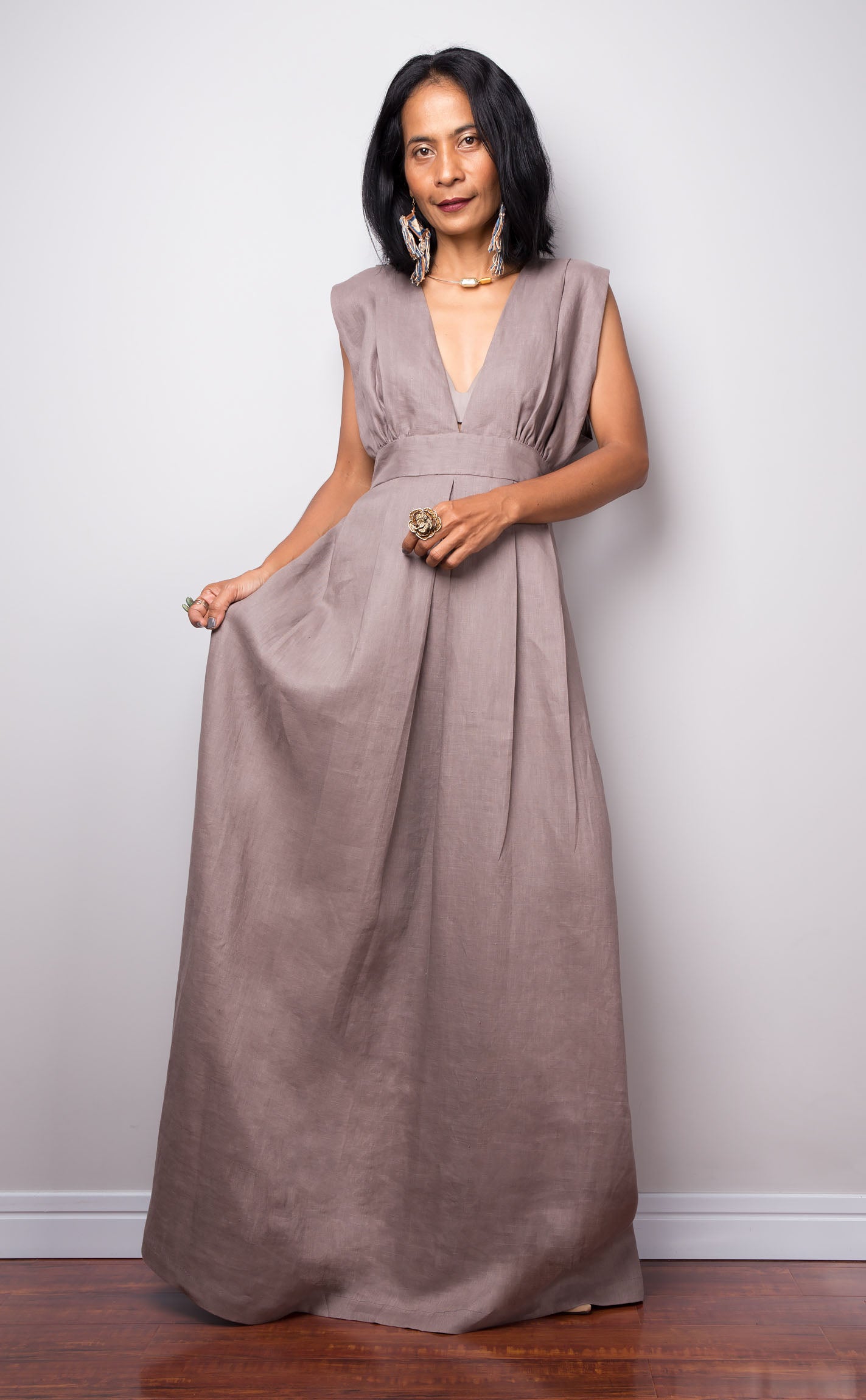 Taupe sleeveless dress with plunging neckline.  High waist design by Nuichan. Front view.