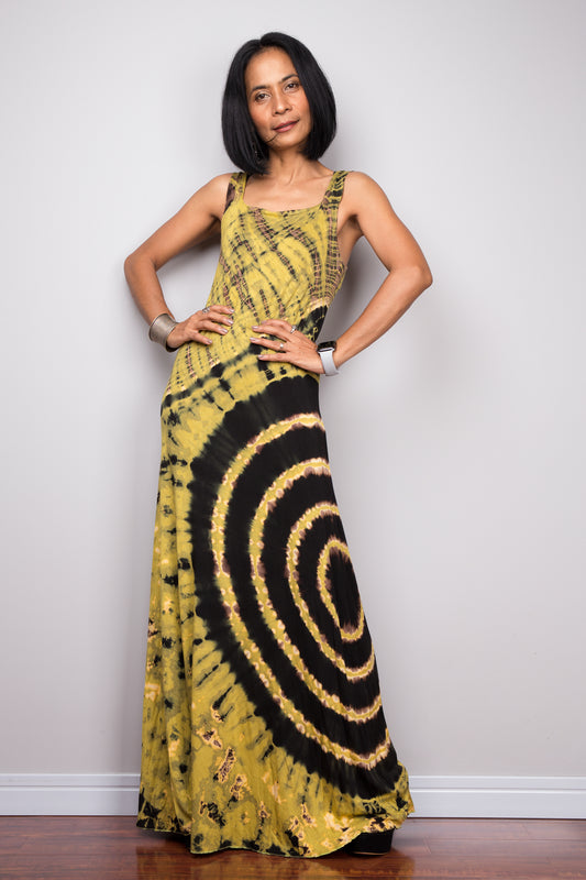 Sleeveless tie dye dress in black and green, yellow.  Body can style dress.