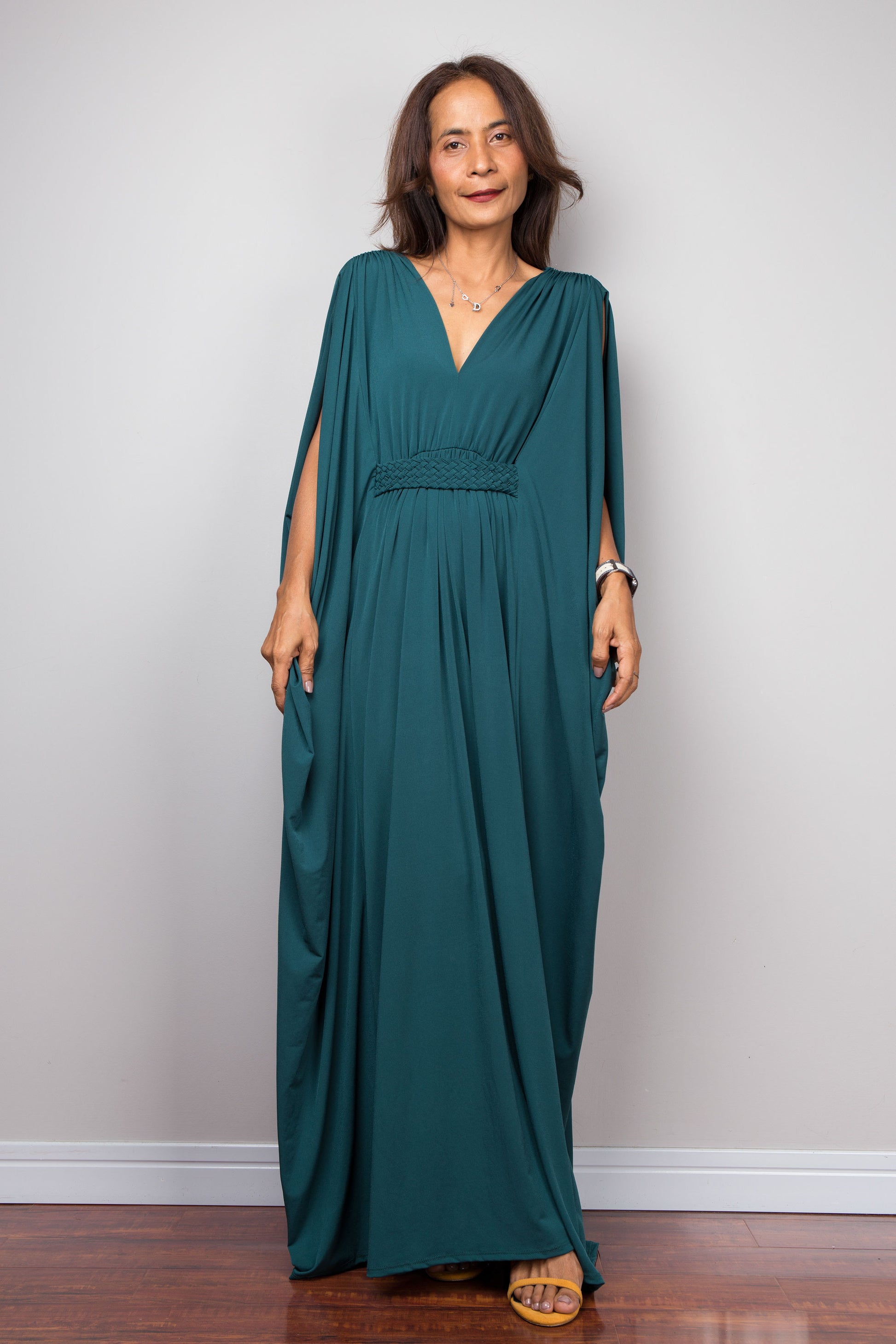 Teal kaftan maxi dress with v neck and braided detail on the waist. Batwing sleeve design