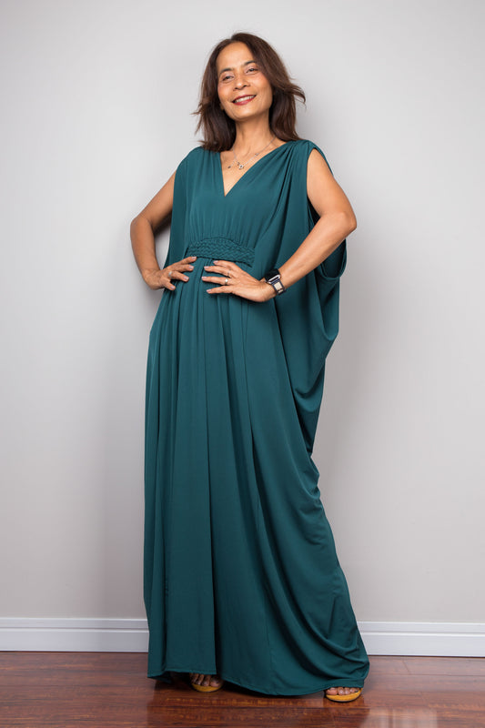 Teal kaftan maxi dress with v neck and braided detail on the waist.