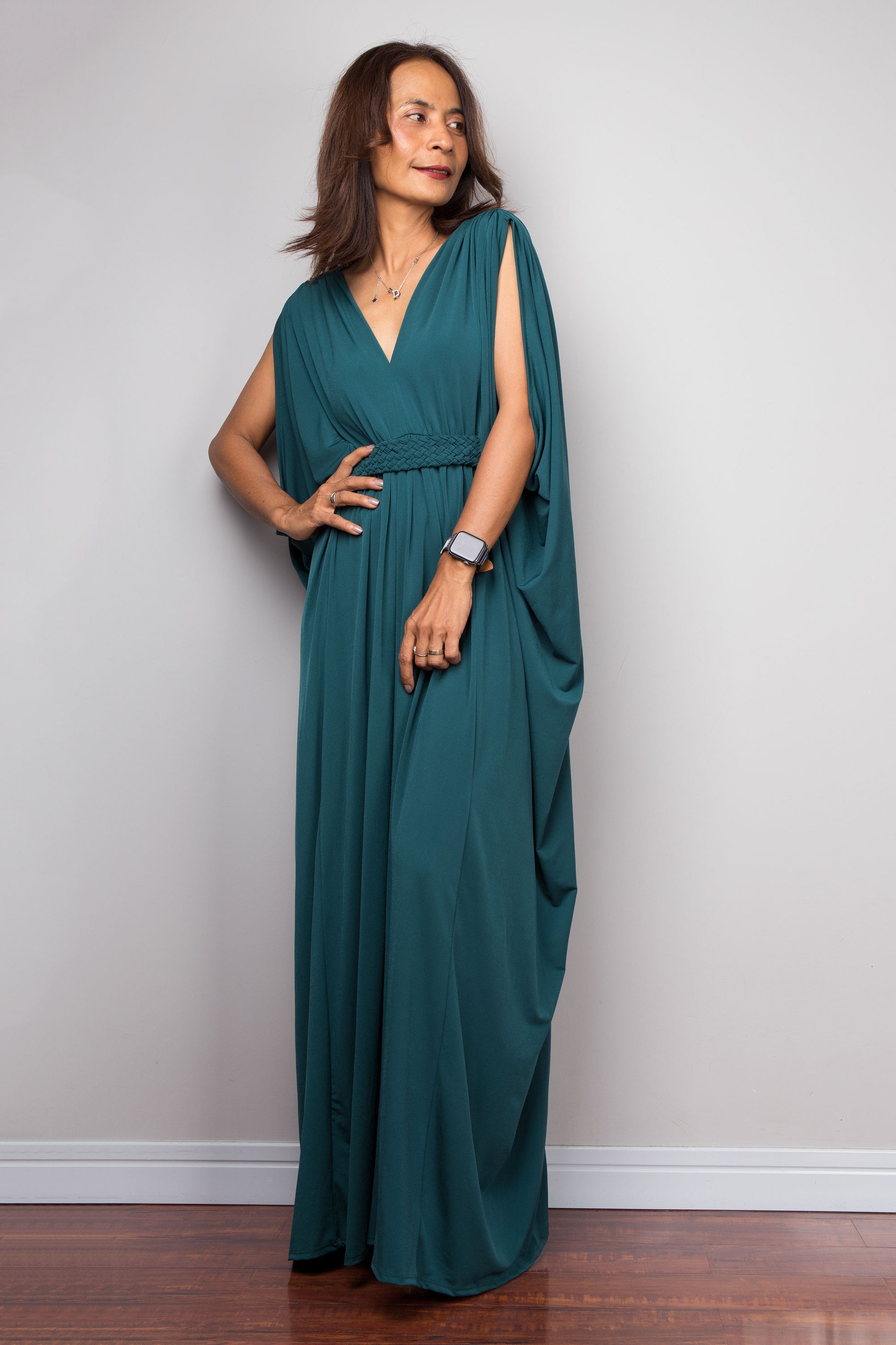 Teal kaftan maxi dress with v neck and braided detail on the waist. Long teal dress with batwing sleeves