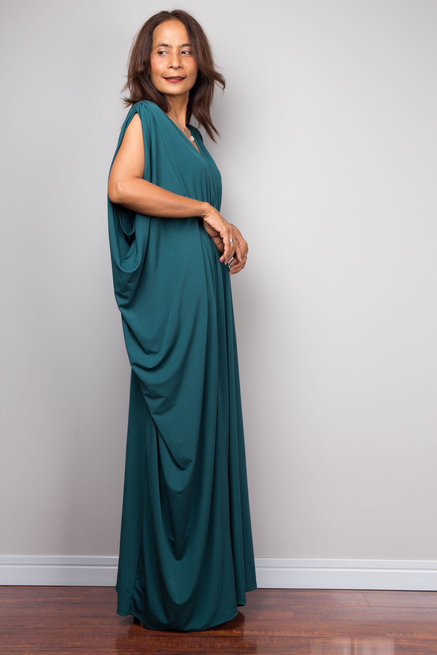 Teal kaftan maxi dress with v neck and braided detail on the waist. Batwing sleeve dress