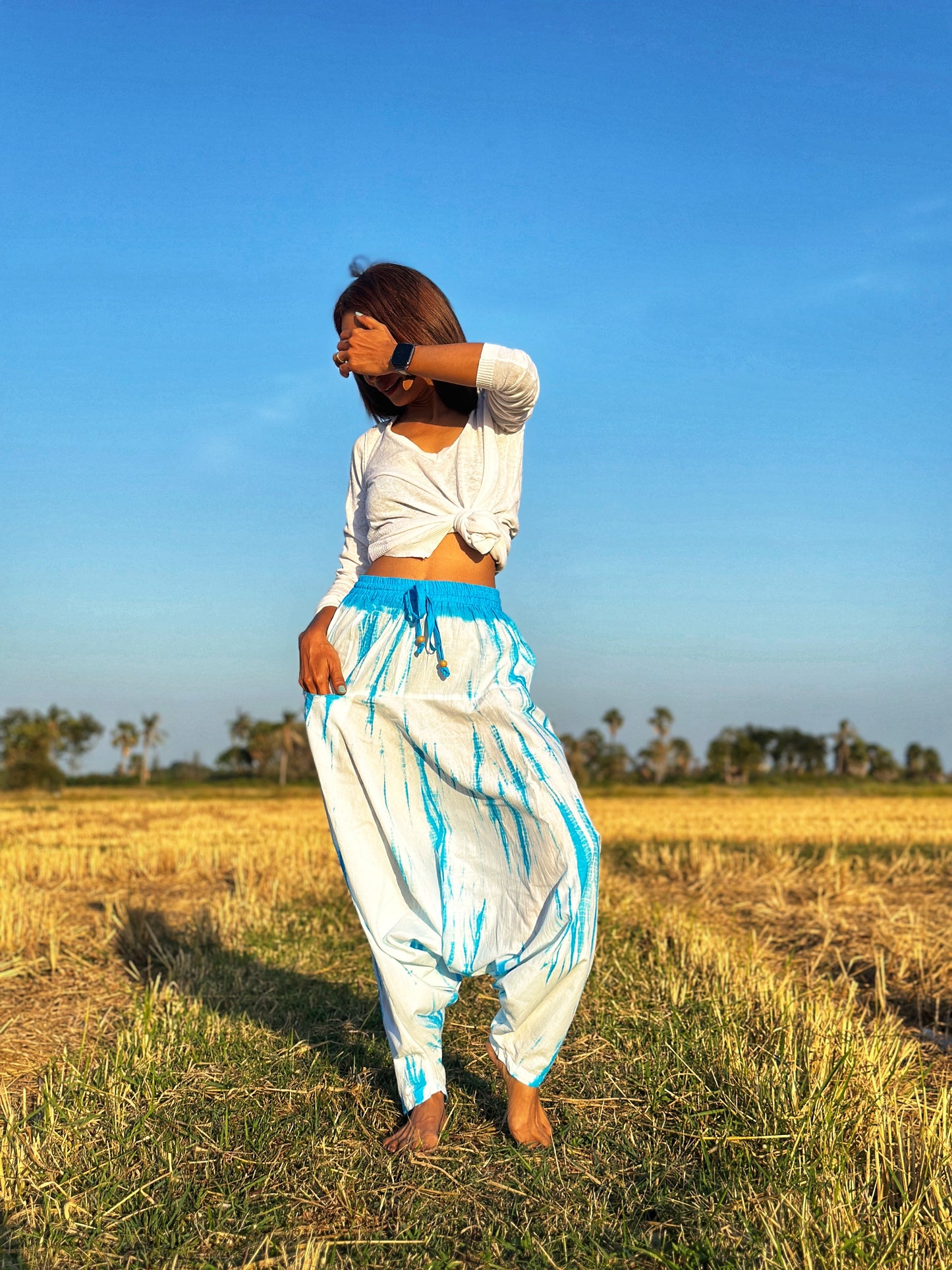 Cotton harem pants by Nuichan.  Shibori tie dye trousers in light blue