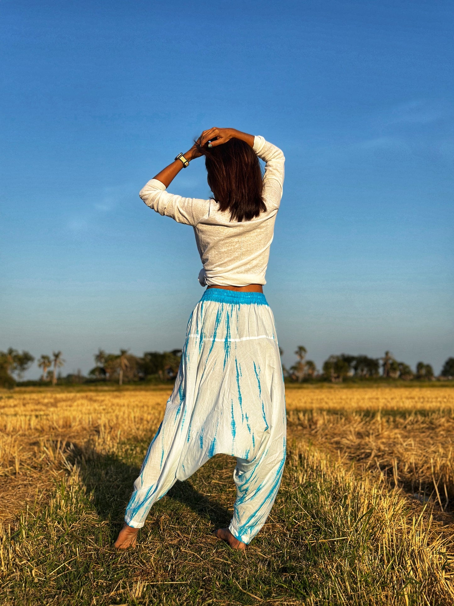 Tie dye harem pants by Nuichan.  Shibori trousers in light blue