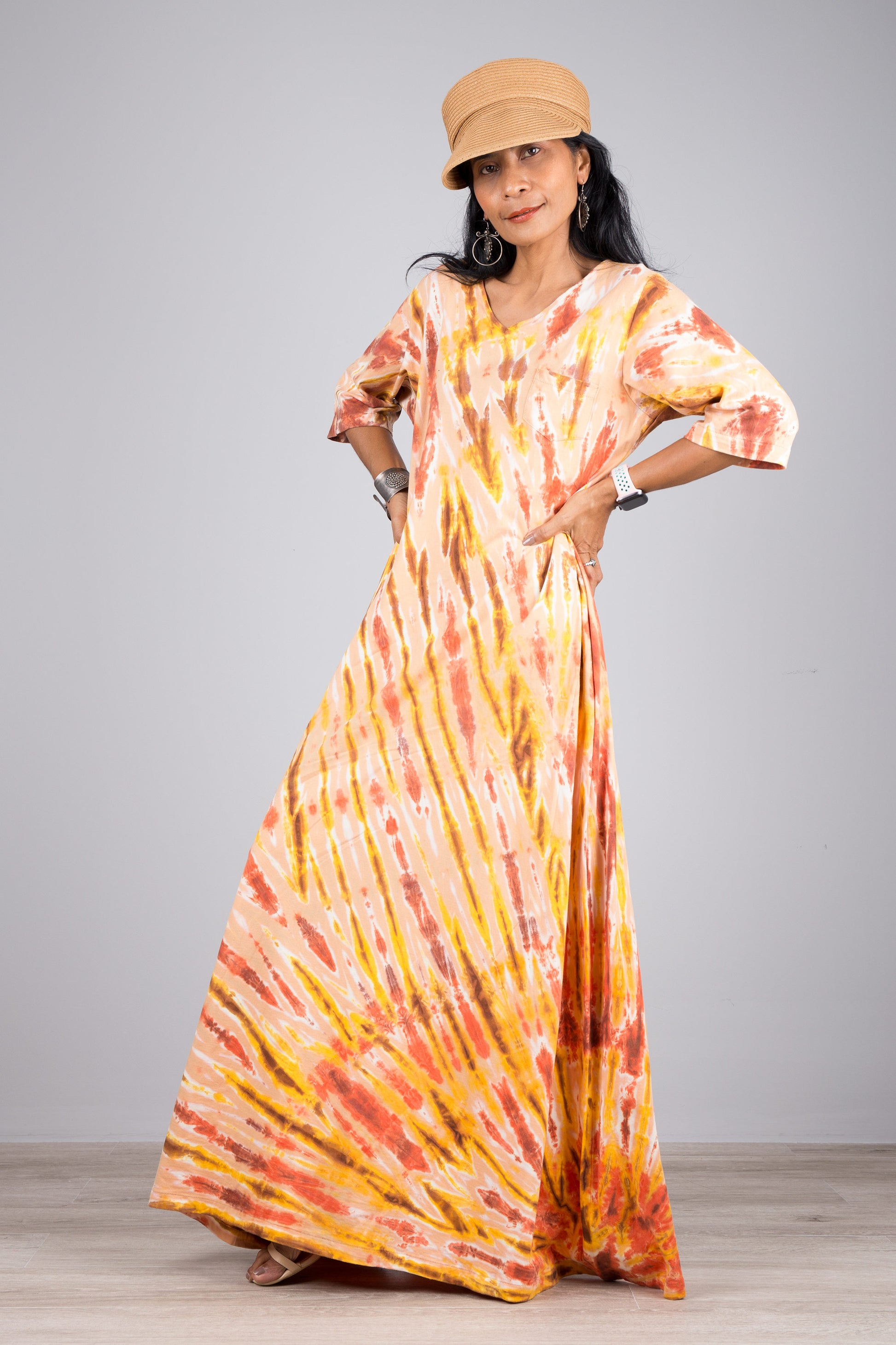 Orange tie dye maxi dress by Nuichan.  Mid length sleeve tie dye dress