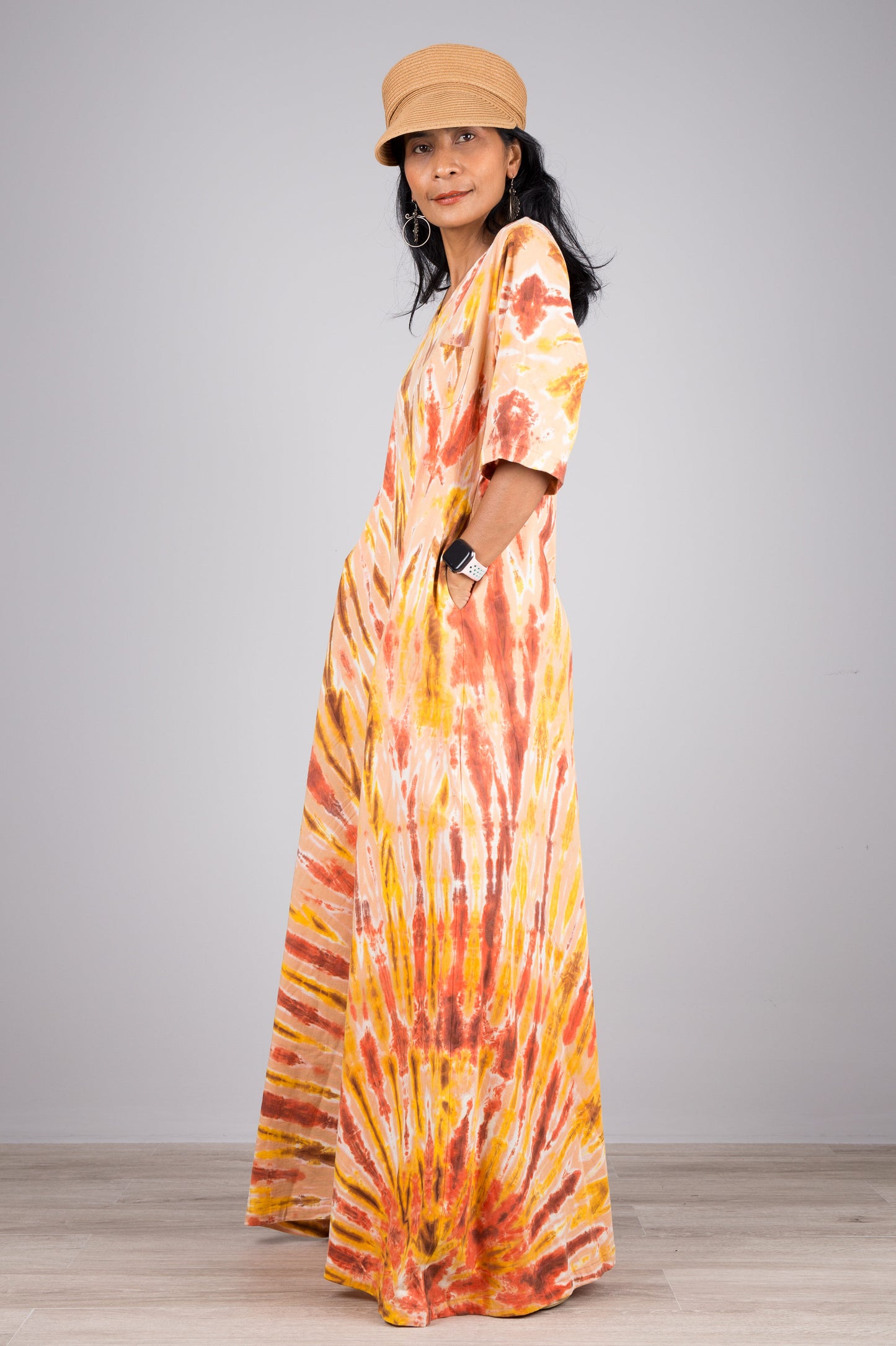 Tie dye dress in orange.  Maxi dress style with mid length sleeves