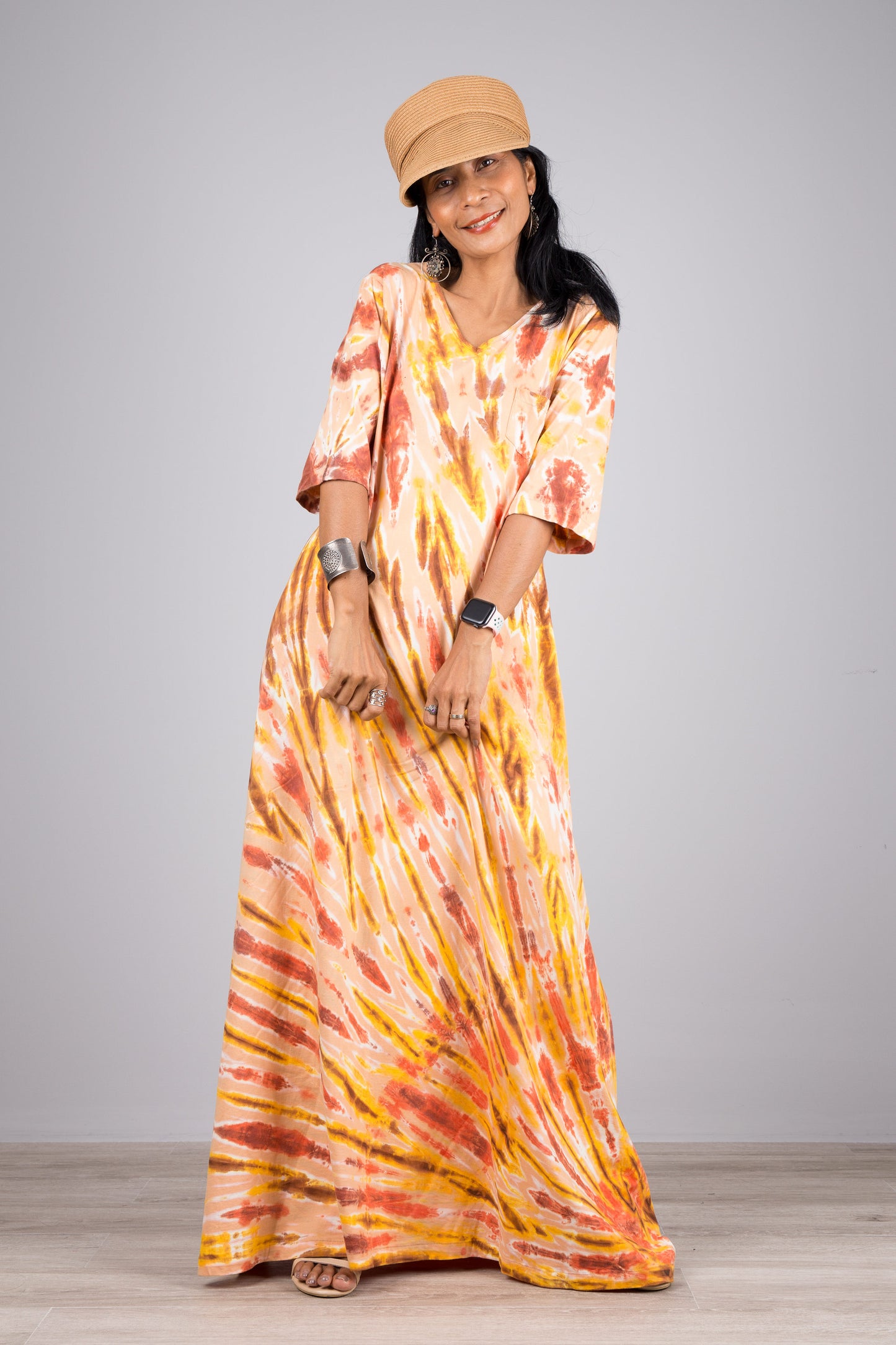 Tie dye maxi dress in orange.  Hippie dress style with mid length sleeves