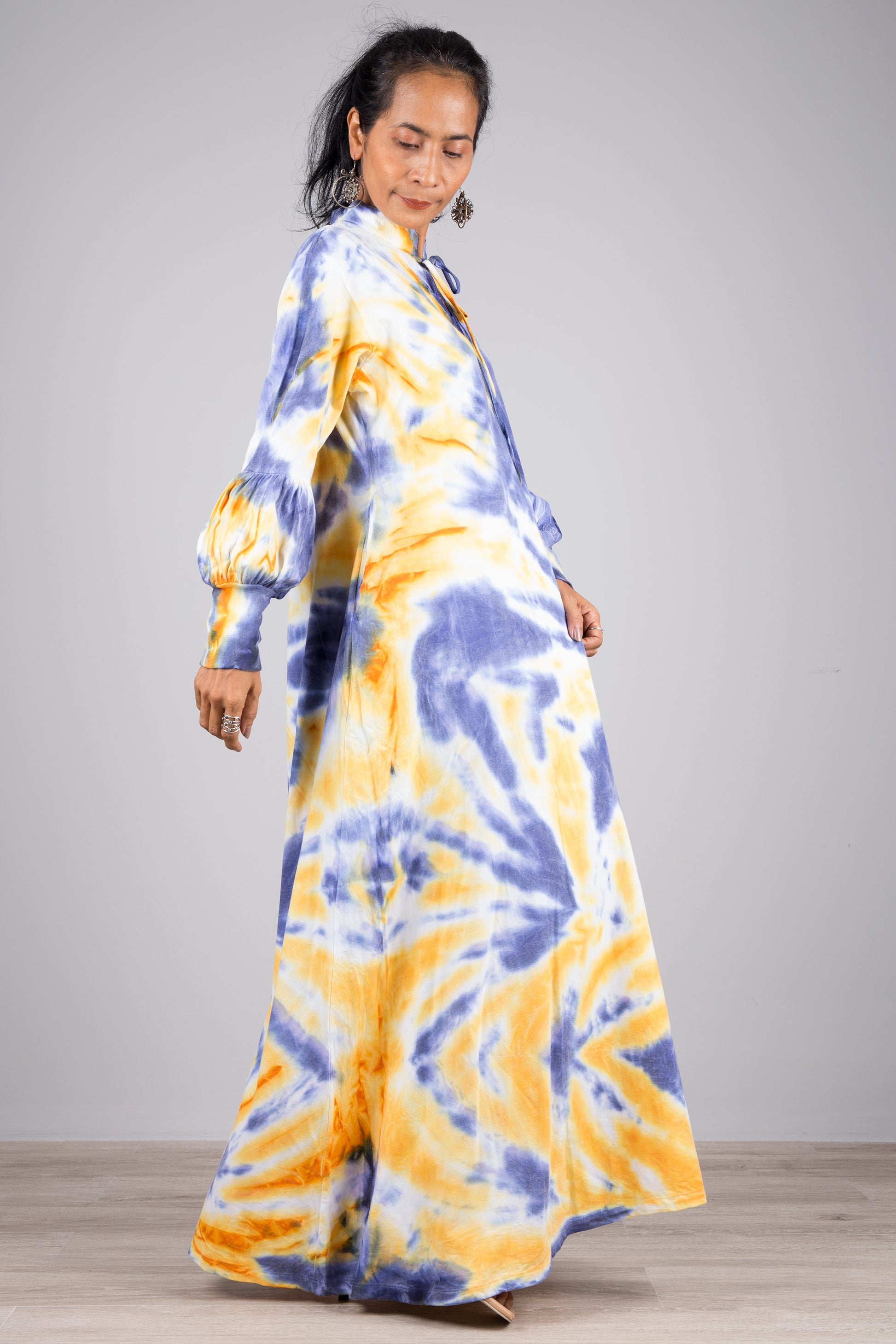 Tie-dye dress with bell sleeves and inseam pockets. Blue tie dye maxi dress by Nuichan