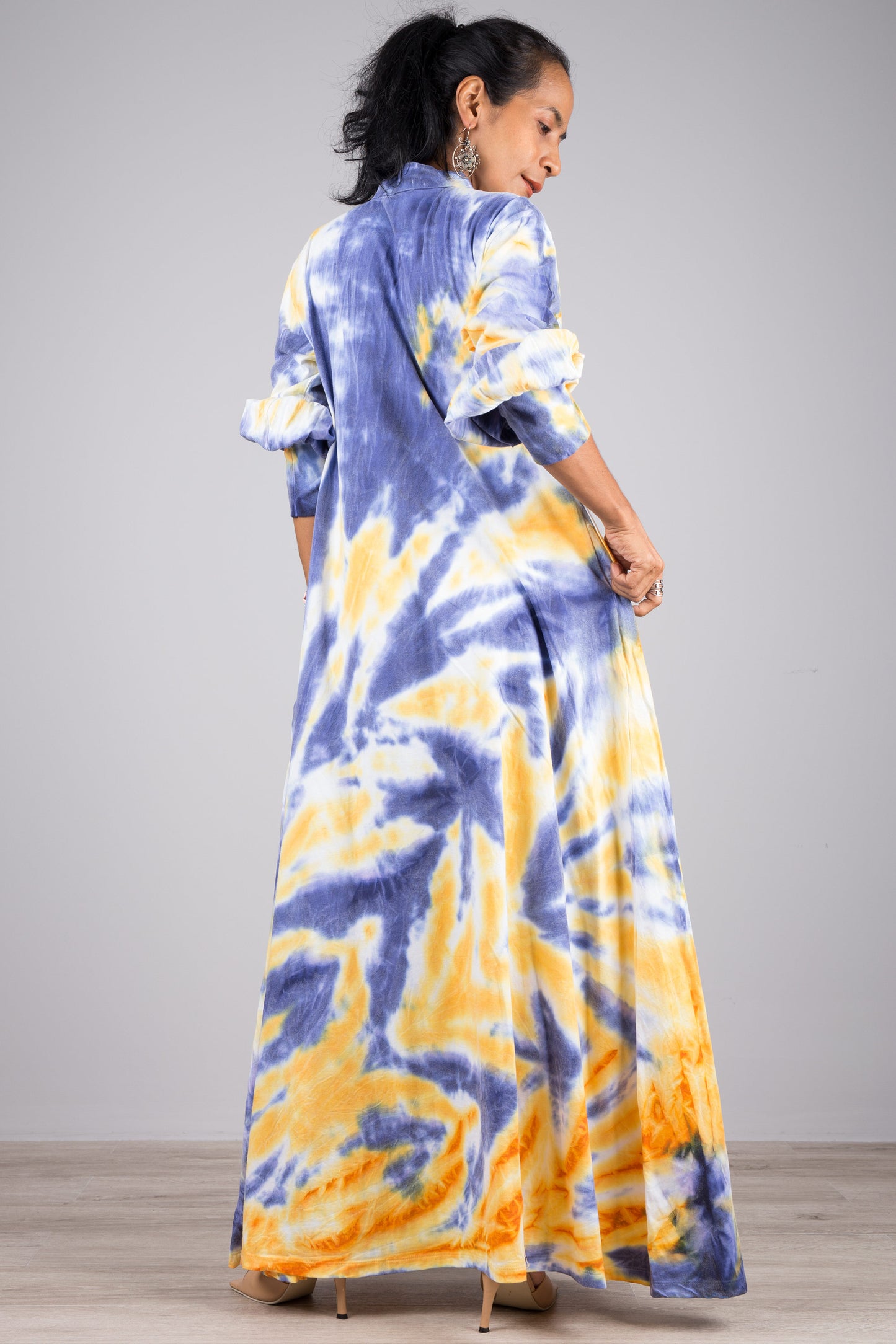 Tie dye dress with bell sleeves and inseam pockets. Blue tie dye maxi dress