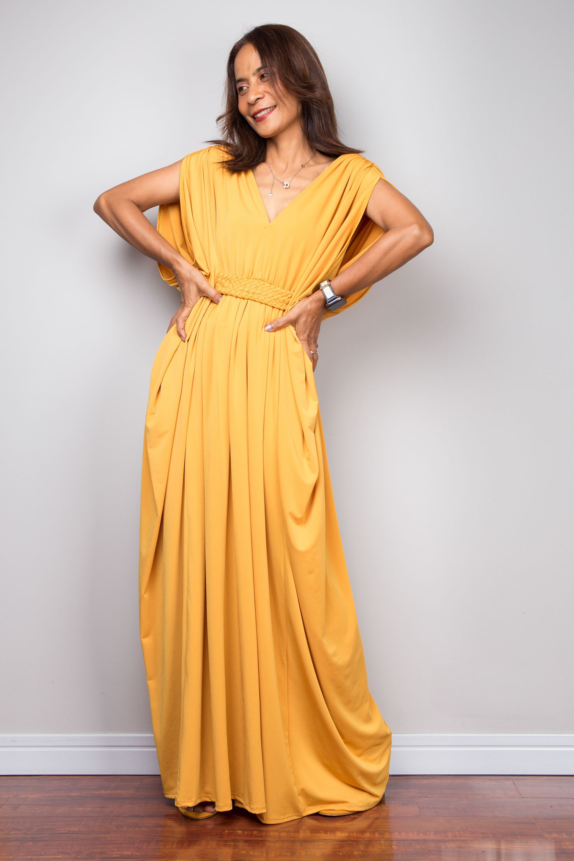 Yellow kaftan maxi dress with braided waist detail and v neck.  Batwing sleeve design - frontal view