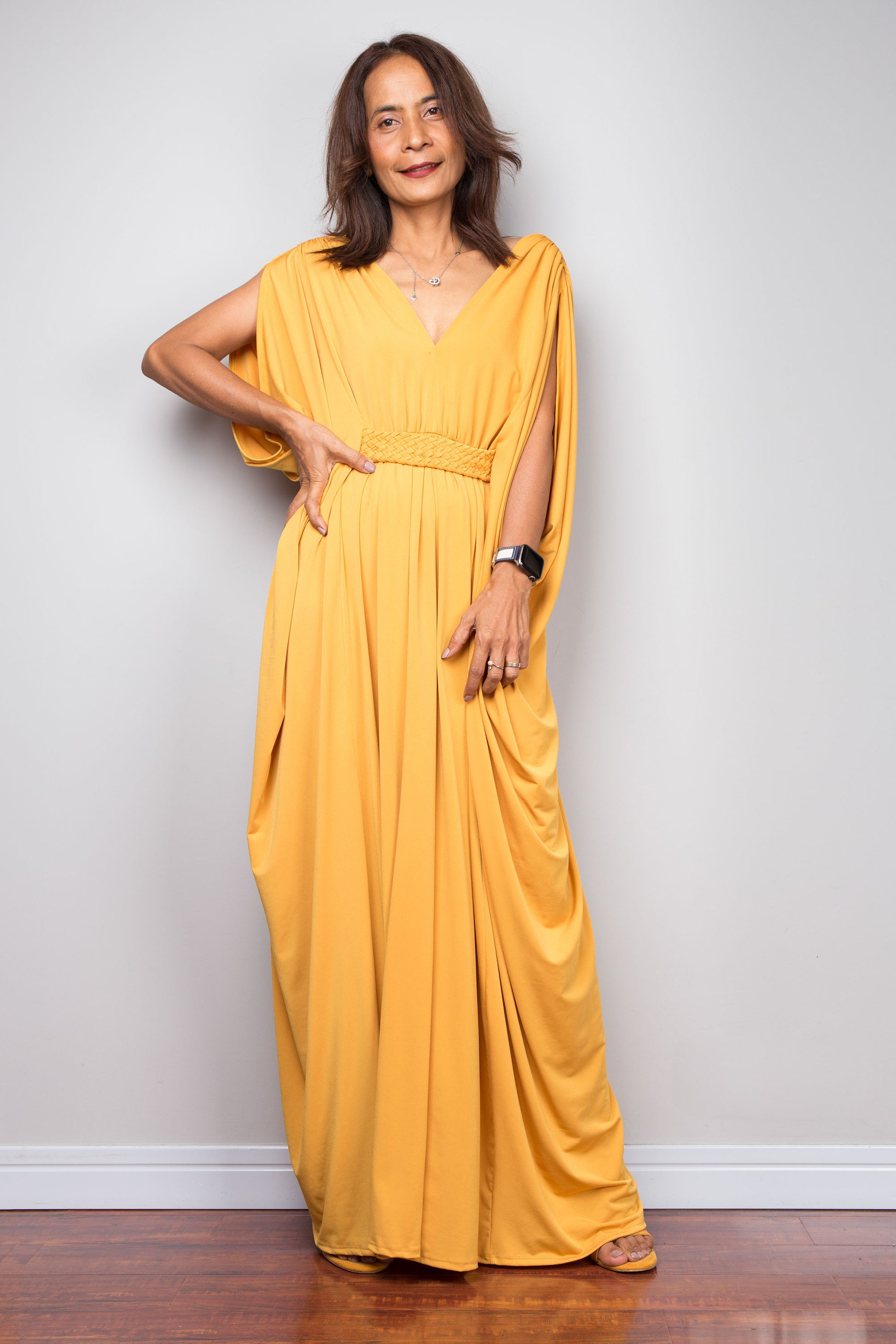 Yellow maxi dress with braided waist detail and v neck. Front view batwing sleeve dress