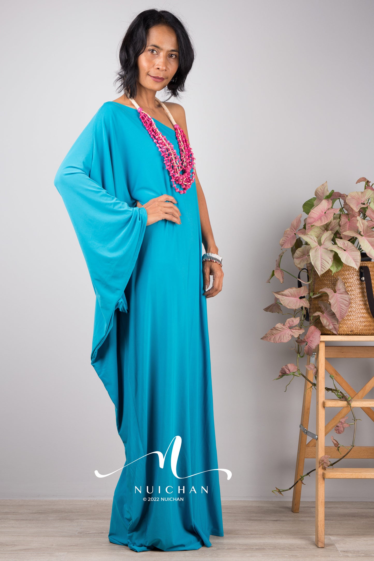 Aqua Blue one shoulder dress with batwing sleeve - Side view