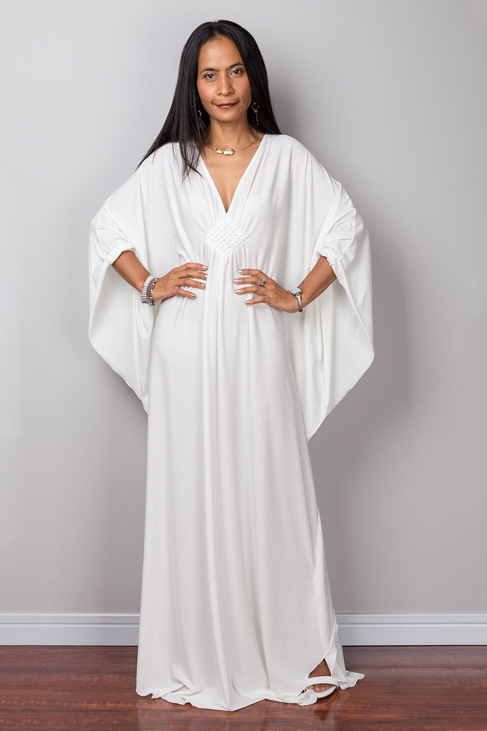 Buy Off white kaftan online.  Shop for white maxi dress by Nuichan.  Kaftan style white dress with plunging neckline.