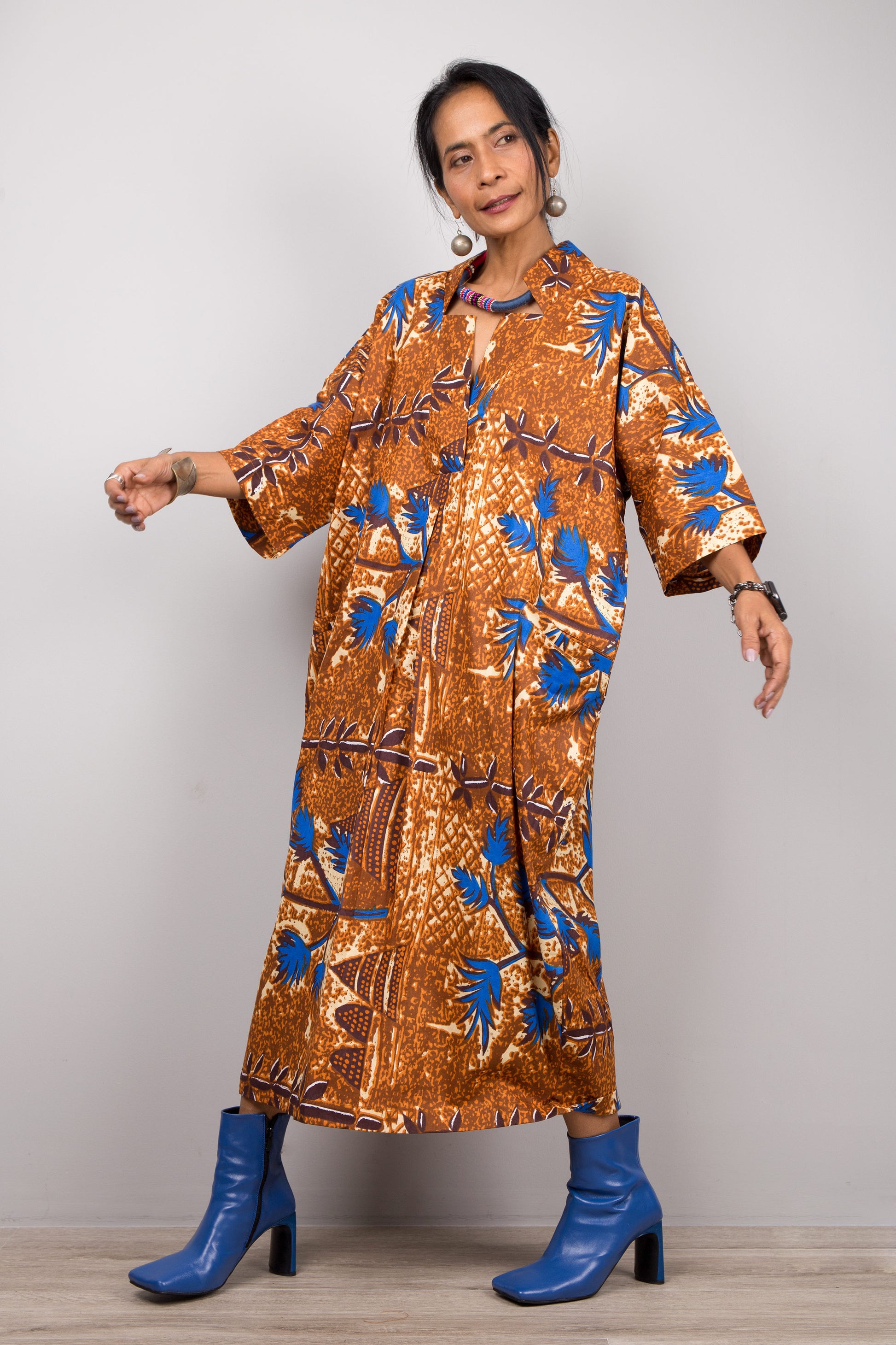 Ankara kaftan dress by Nuichan. Brown and blue dutch wax dress