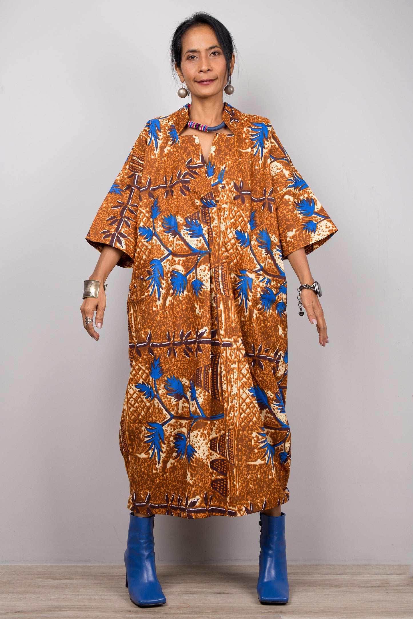 Ankara dress with v neck collar.  Brown and blue tone dress by Nuichan