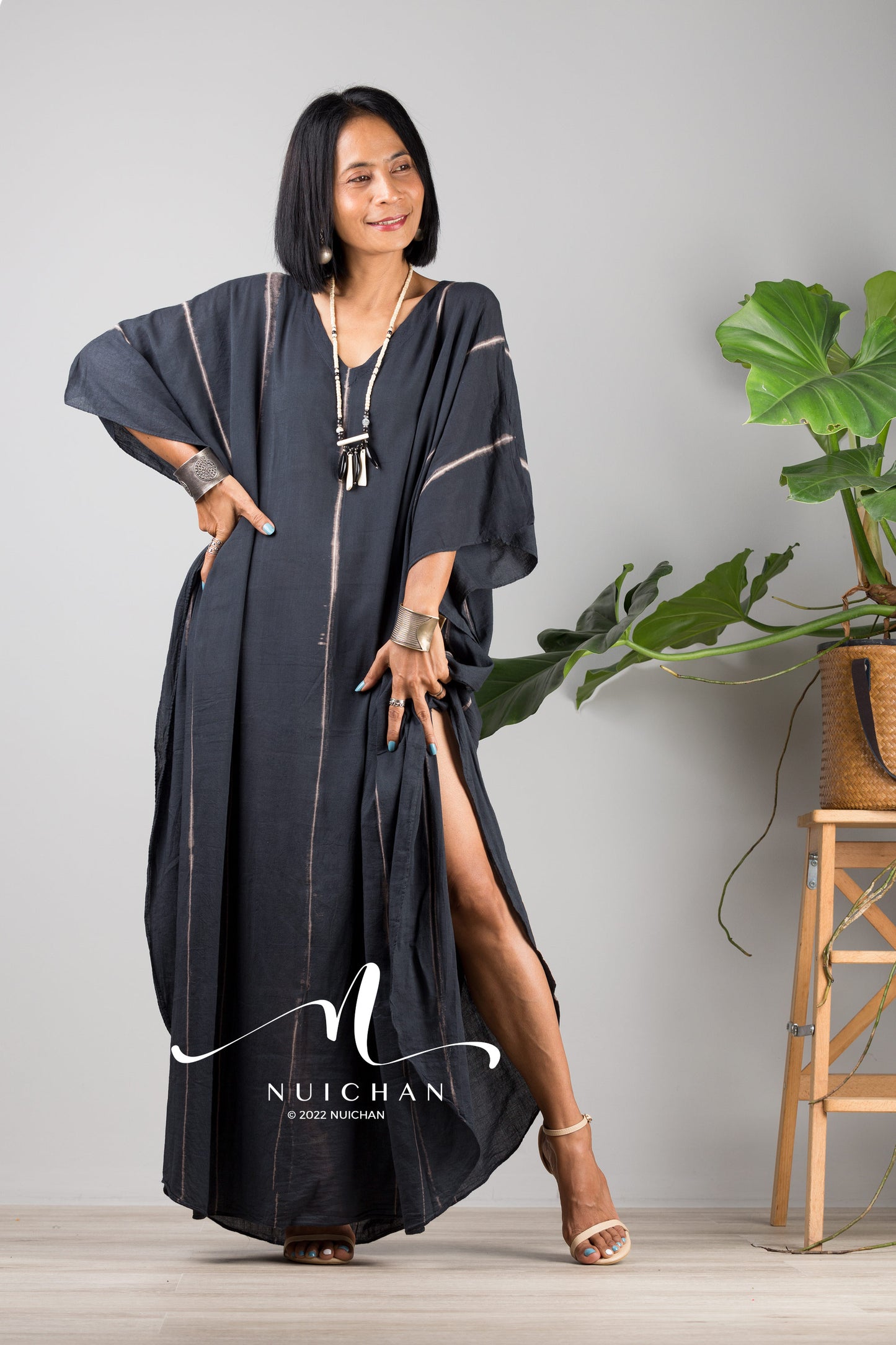 Nuichan Black Tie dye kaftan for women. Long black cotton dress with stripes and split - front view