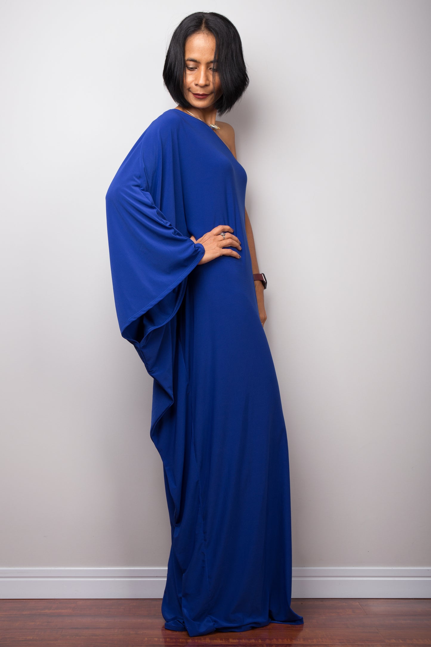 Royal blue one shoulder dress by Nuichan. Side view